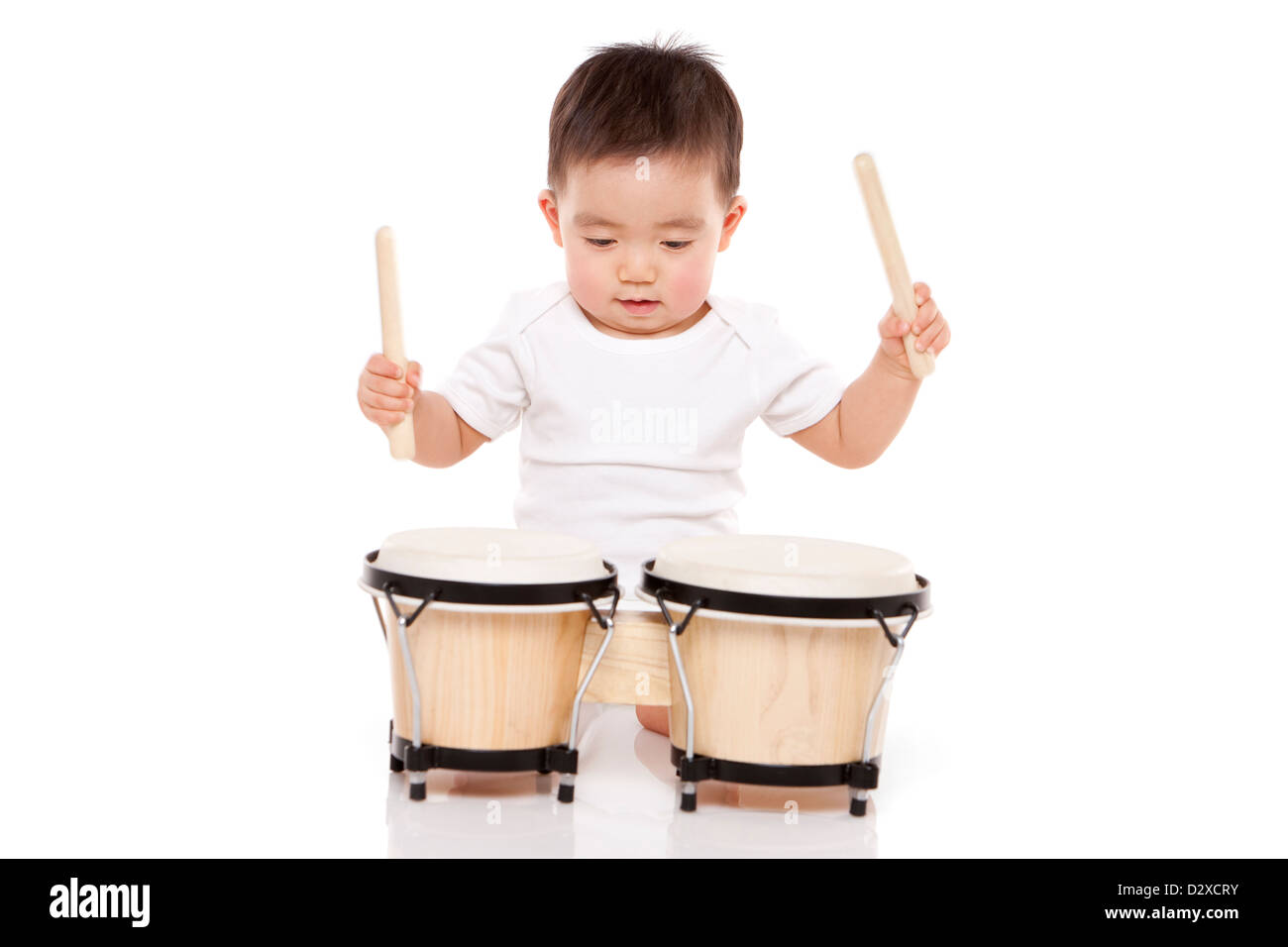 Lovely baby boy playing bongo drum Stock Photo Alamy