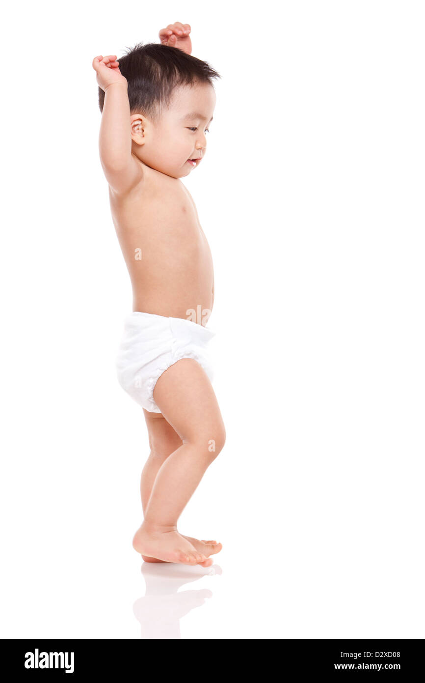 Baby In Diaper Walking Stock Photos & Baby In Diaper Walking Stock