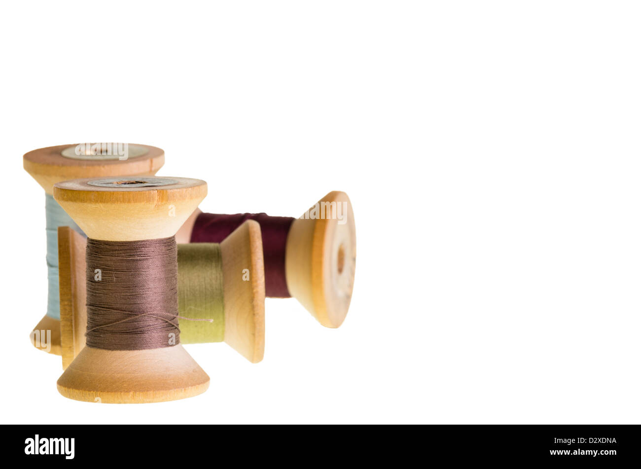 Spools of sewing thread isolated on white Stock Photo