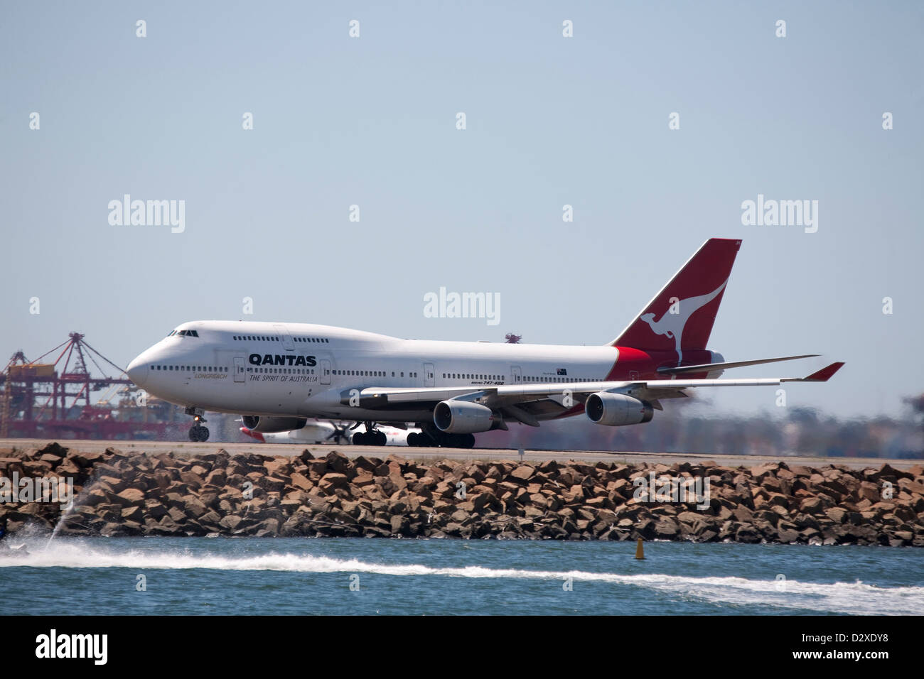 Qantas Boeing 747-400 Jumbo Jet Aircraft 'City of Darwin' landing at Kingsford Smith Airport Sydney Australia Stock Photo