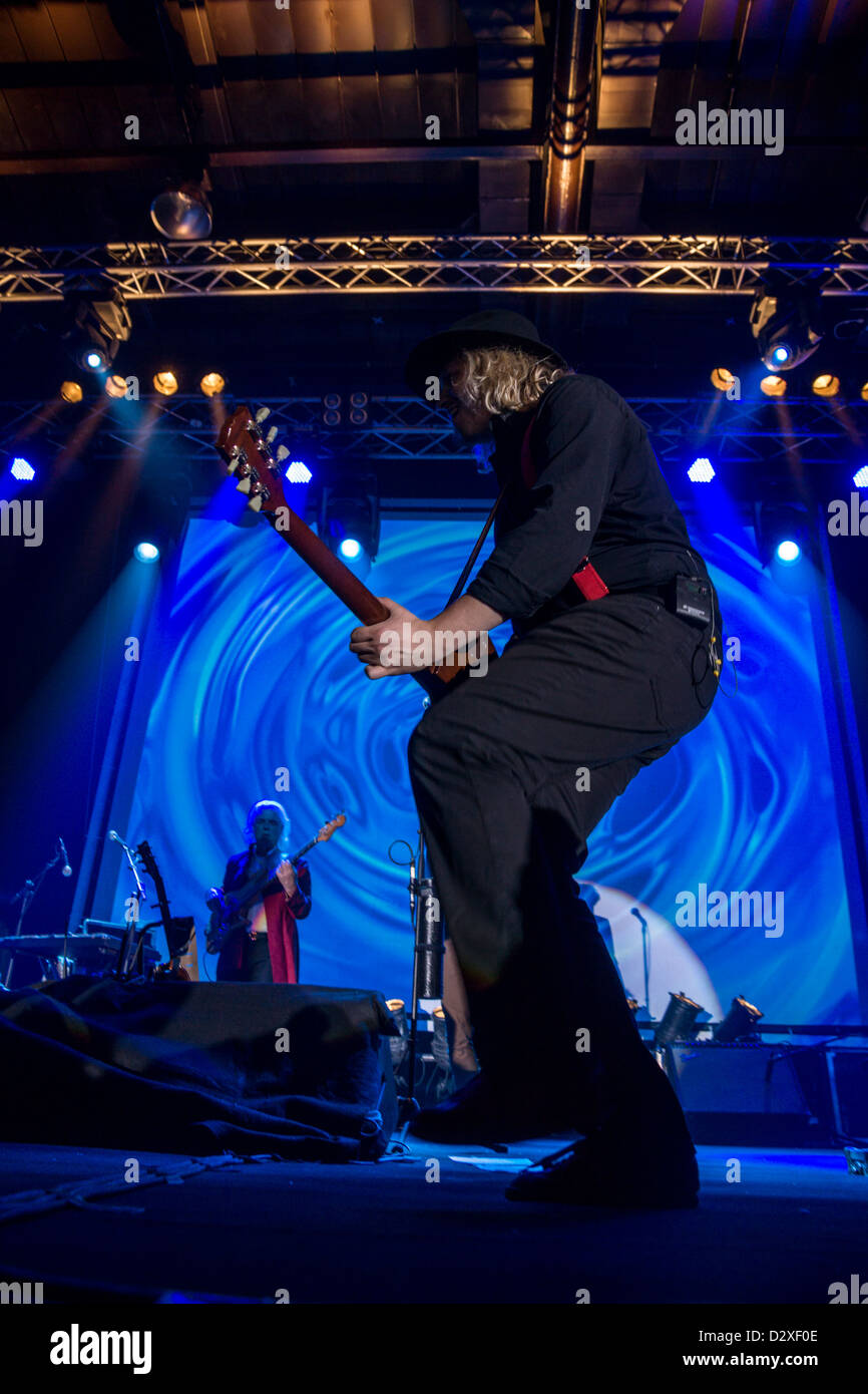 A guitarist and a Bass player (Florian Opahle and David goodier from the ian anderson touring band) on stage. Stock Photo