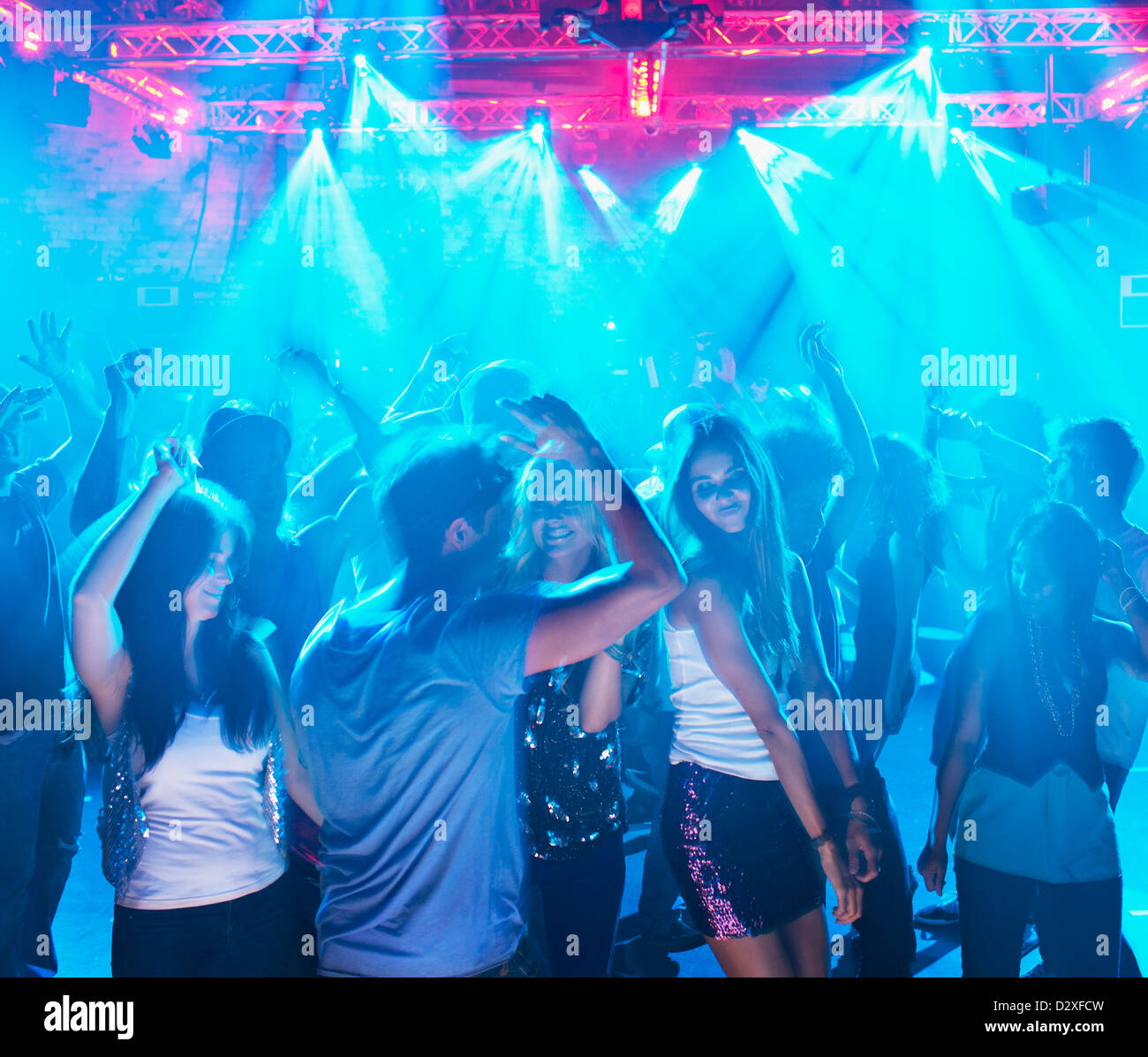 People dancing on dance floor of nightclub Stock Photo - Alamy