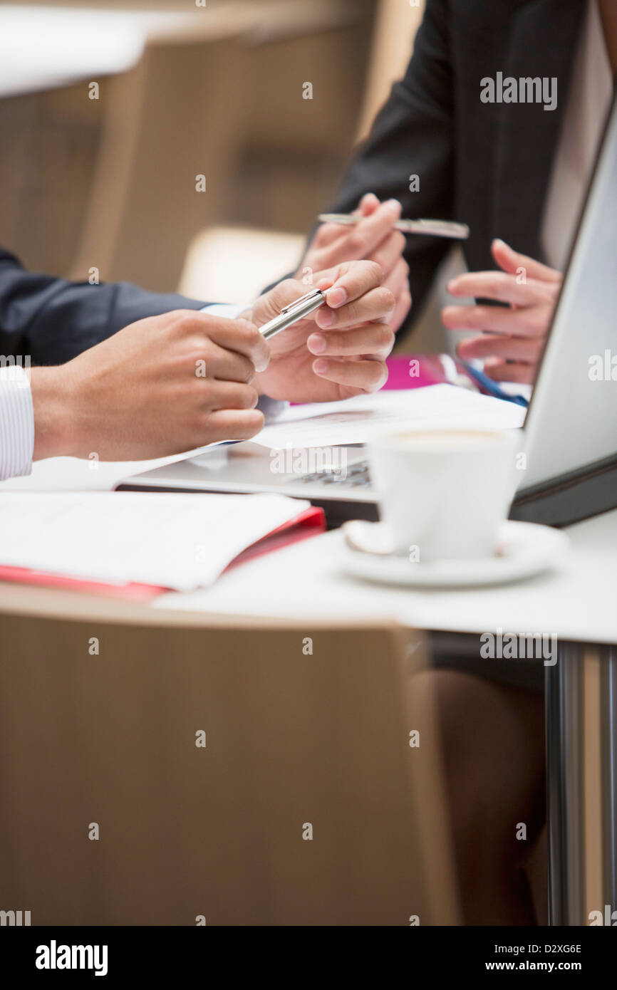 Businessman and businesswoman meeting at cafe Stock Photo - Alamy