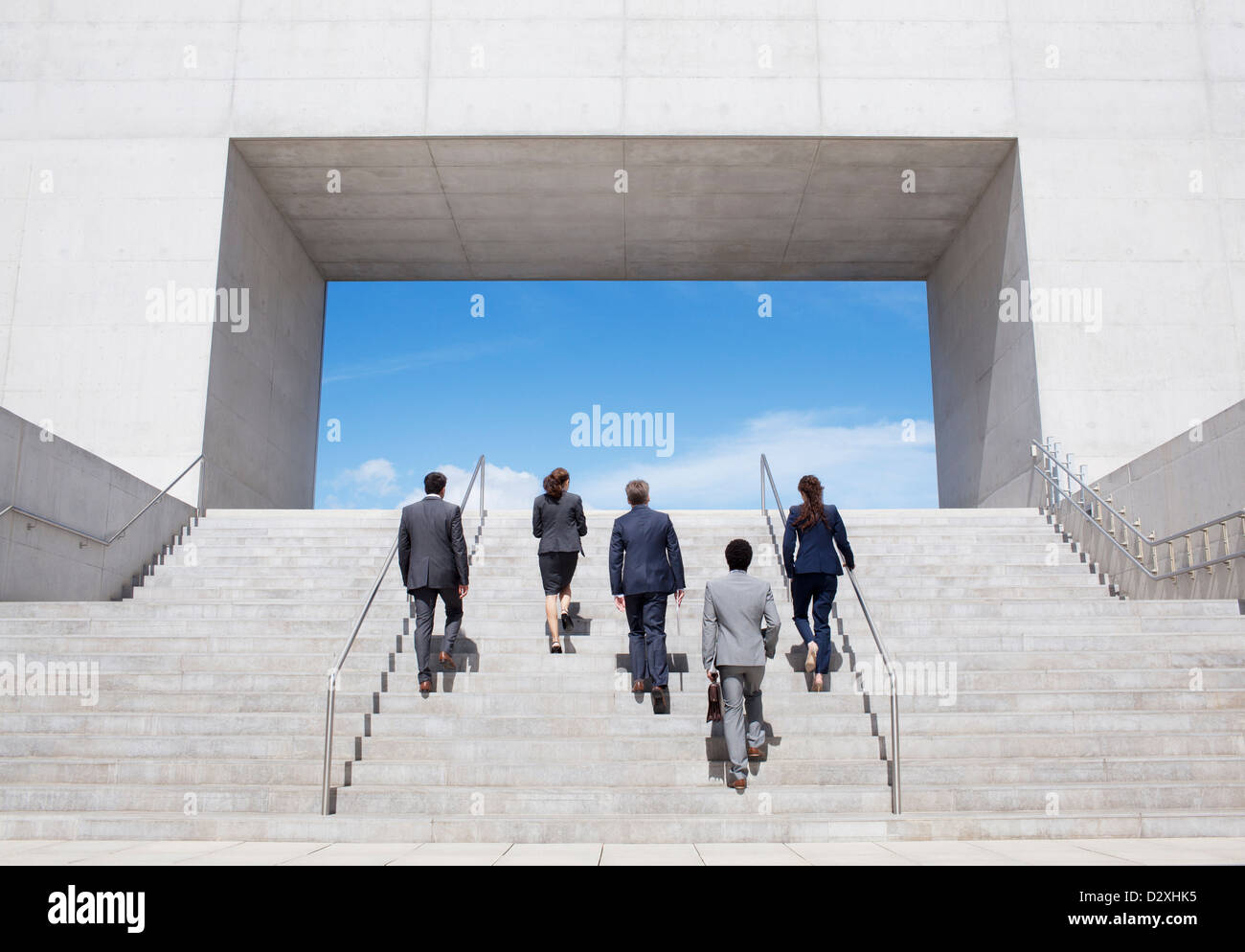 Business people climbing stairs hi-res stock photography and images - Alamy