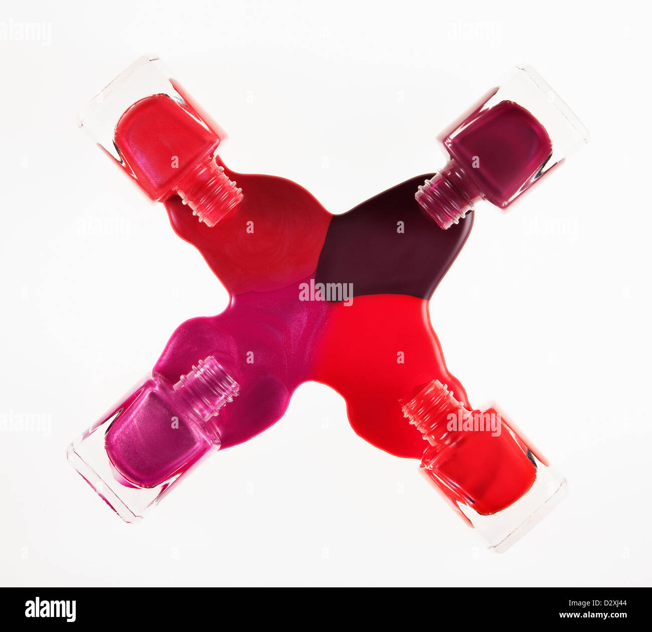 Multicolor fingernail polish spilling from bottles Stock Photo Alamy
