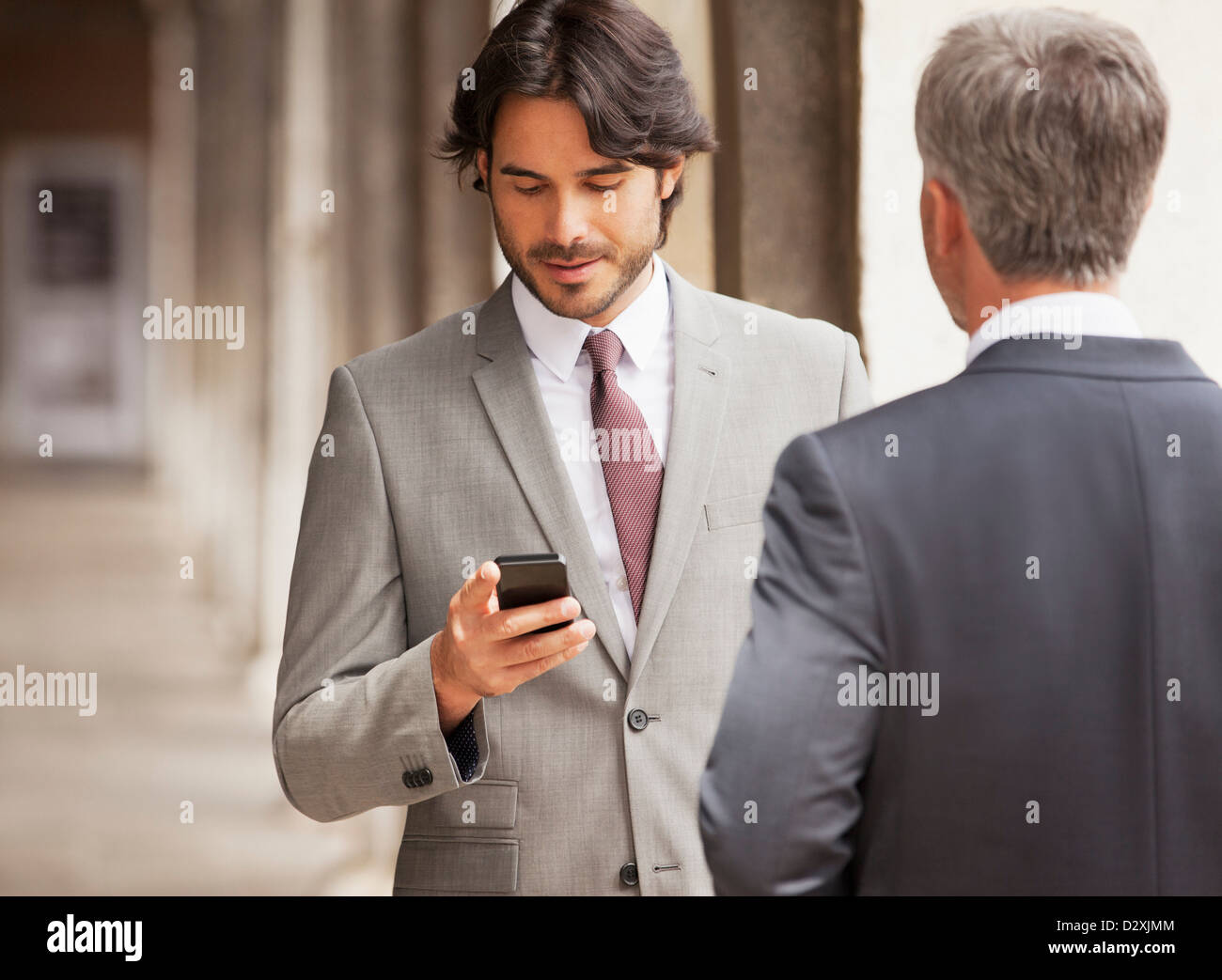 Checking her phone hi-res stock photography and images - Alamy