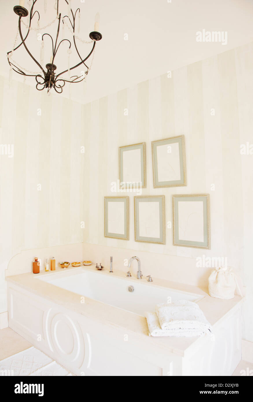 Chandelier over bathtub in luxury bathroom Stock Photo