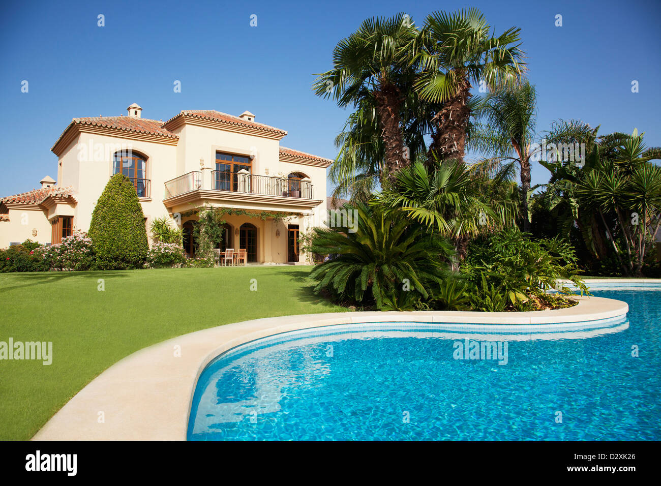 Swimming pool and Spanish villa Stock Photo - Alamy