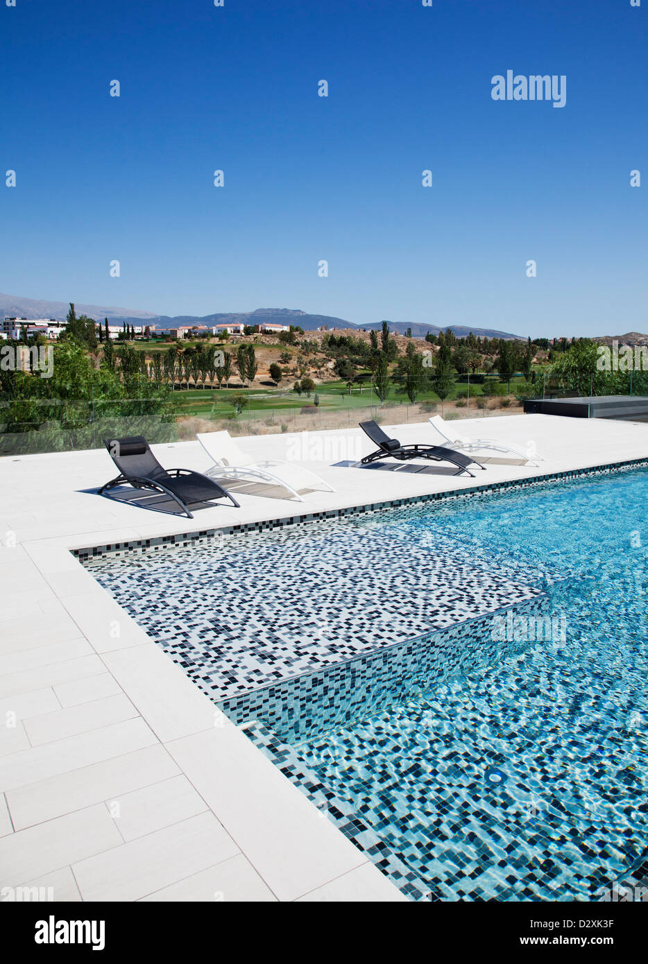 in pool lounge chairs on People Lounge Chair Pool Sunny High Resolution Stock Photography And Images Alamy