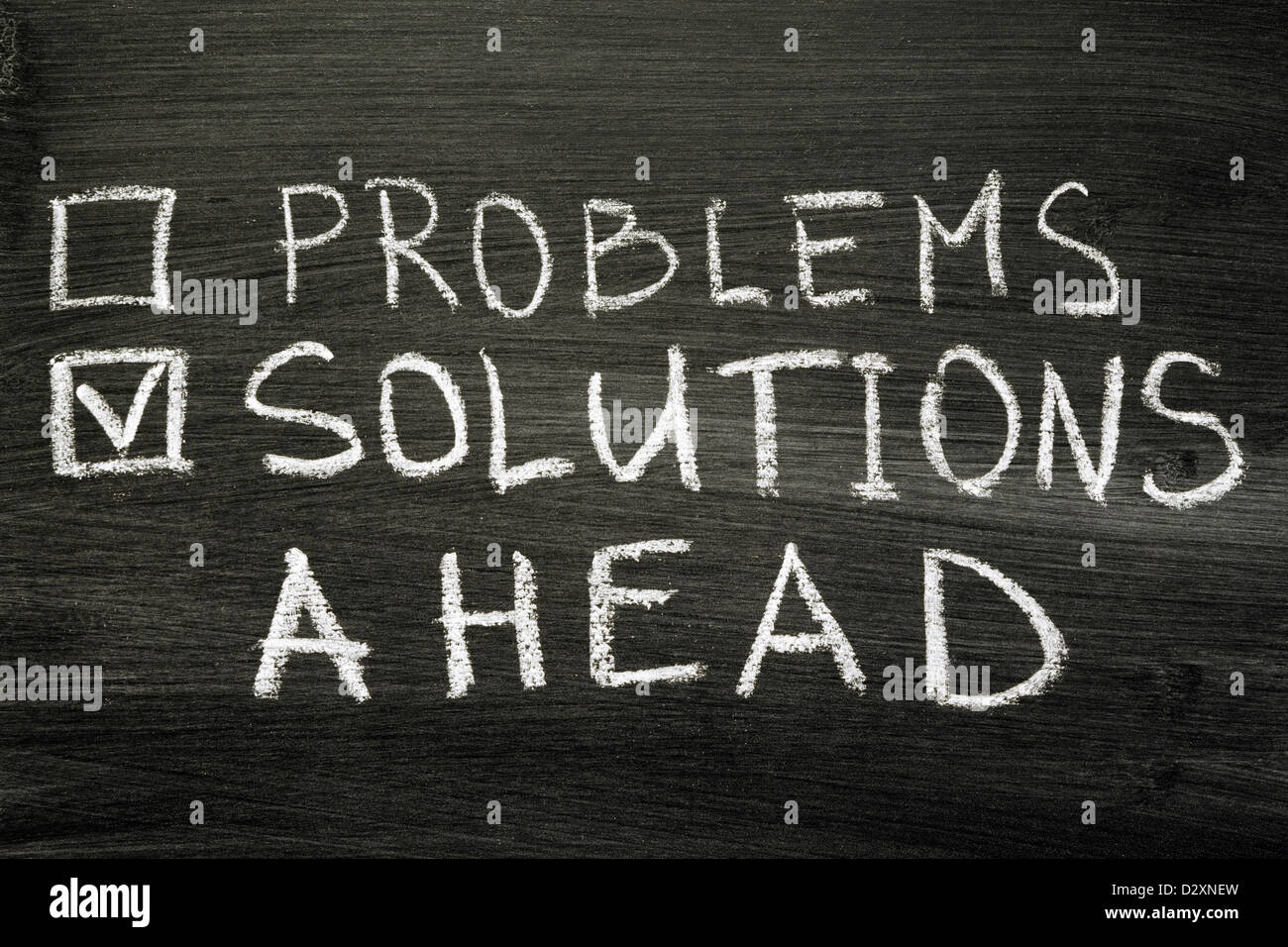 positive thinking concept, expectation of future solutions, not problems handwritten on school blackboard Stock Photo