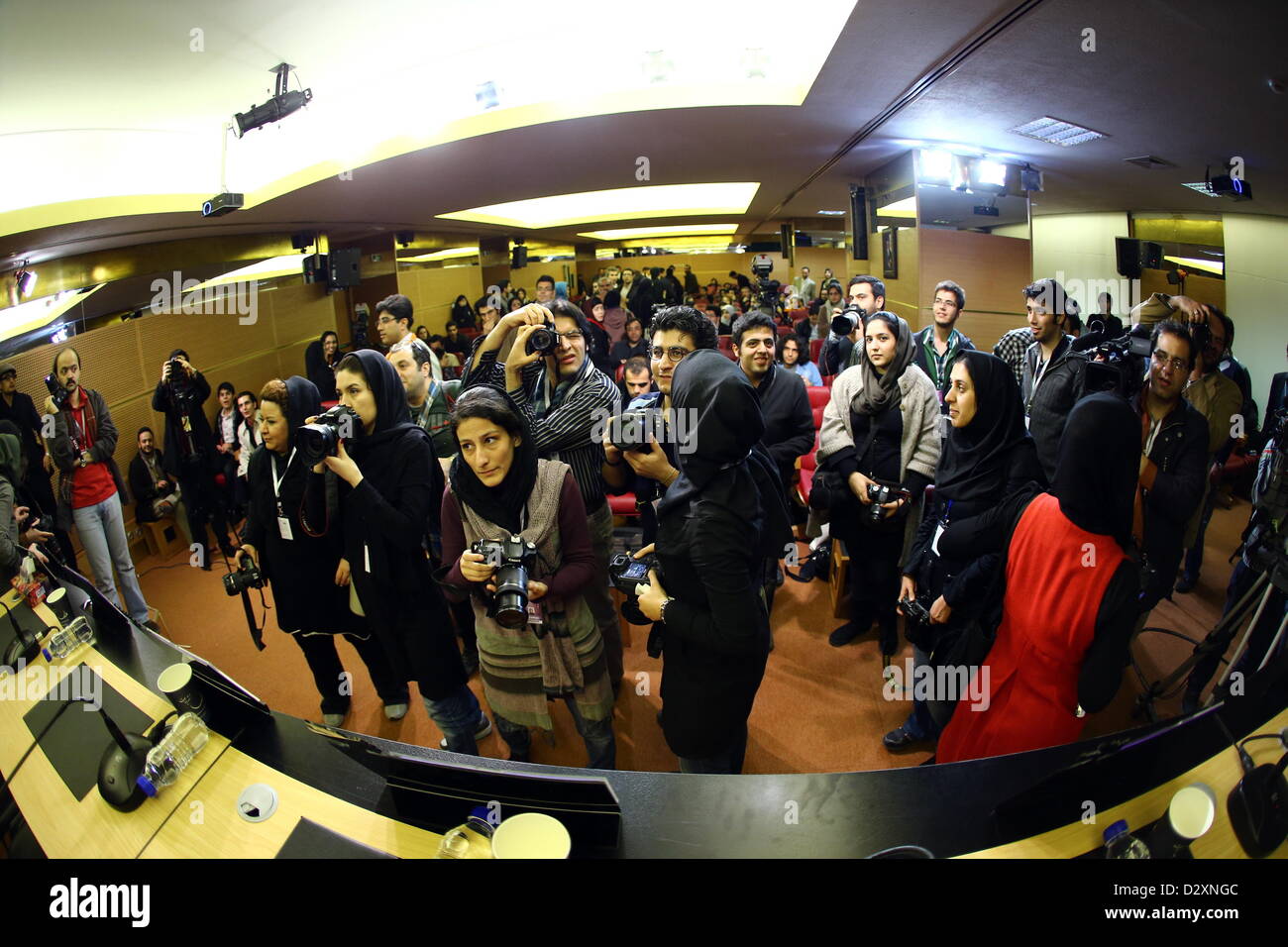 TEHRAN, IRAN: Photographers waiting for press conference at Day 2 of the 31th International Fajr Film Festival on February 1, 2013 in Tehran, Iran. Organized by the Ministry of Culture and Islamic Guidance, the Film Festival is the most important film event in the country. (Photo by Gallo Images / Amin Mohammed Jamali) Stock Photo
