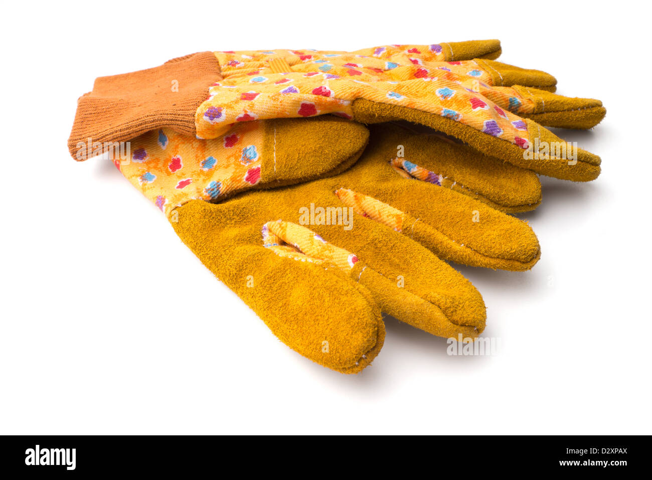 Gardening: pair of yellow gardeners protective gloves, isolated on white background Stock Photo