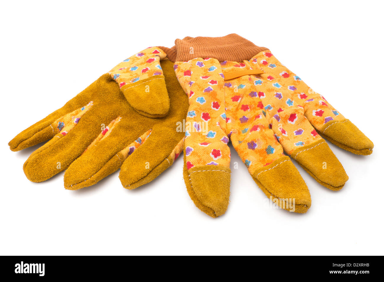 Gardening: pair of yellow gardeners protective gloves, isolated on white background Stock Photo