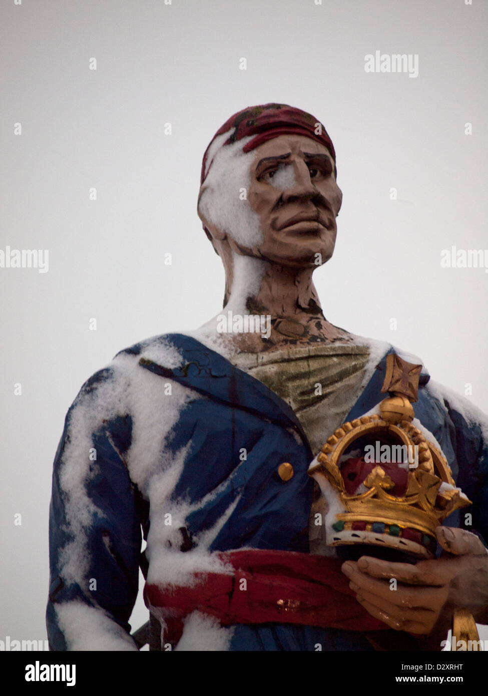 A wooden effigy of a buccaneer outside the Crown & Anchor pub in Shoreham-by-Sea. Stock Photo