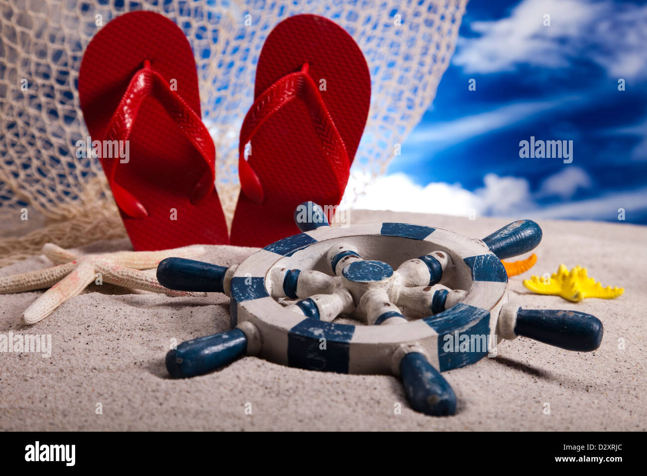 Sand beach and flip flops Stock Photo - Alamy