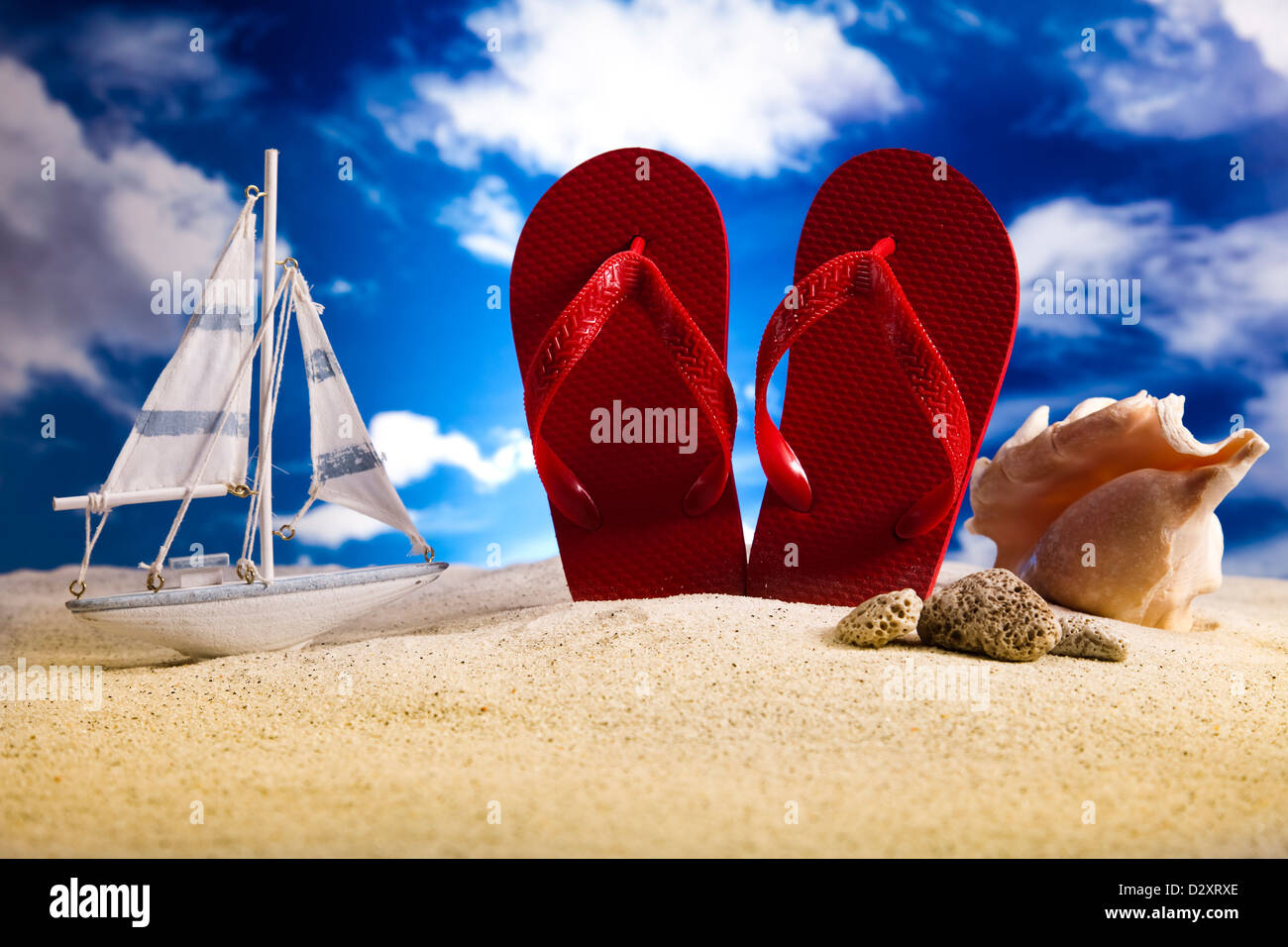 Sand beach and flip flops Stock Photo - Alamy