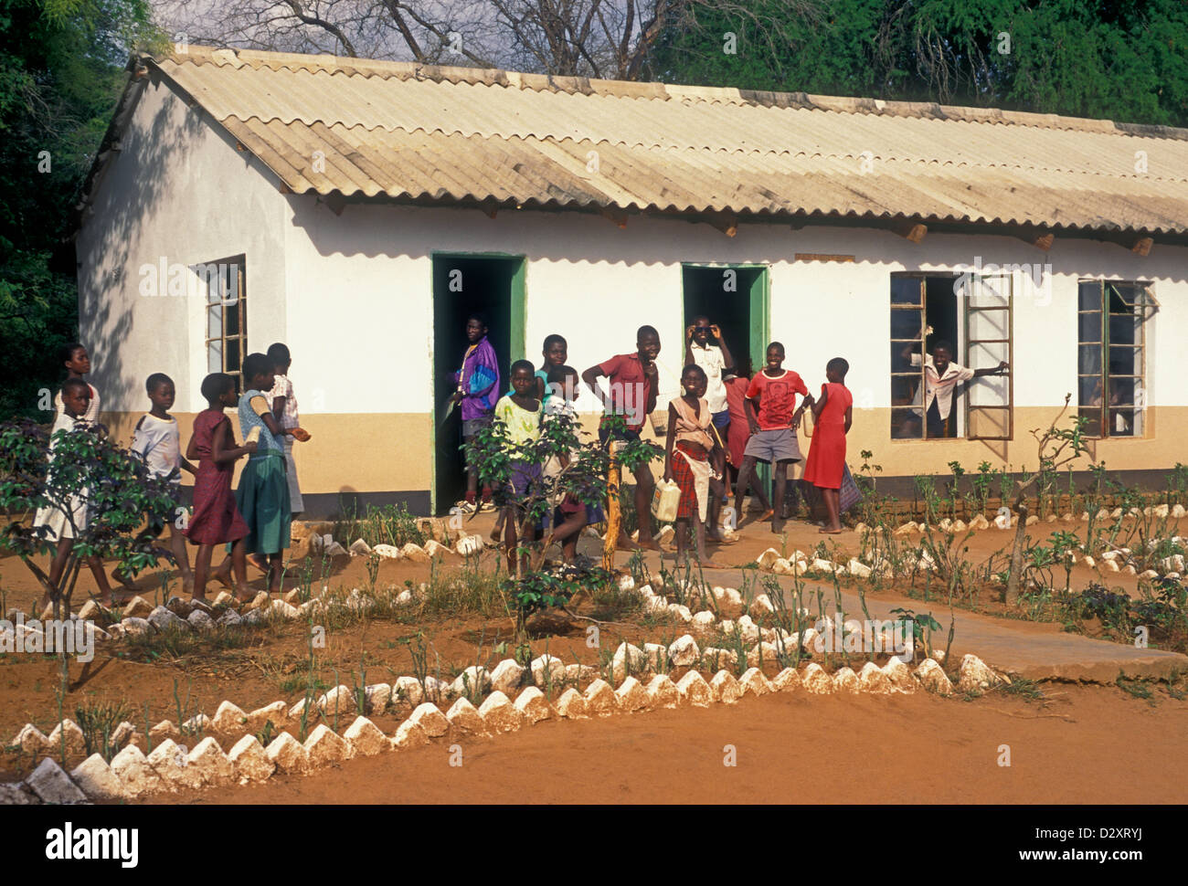 Zimbabwean boys and girls, boys, girls, children, schoolchildren, schoolboys, schoolgirls, village of Mahenye, Manicaland Province, Zimbabwe, Africa Stock Photo