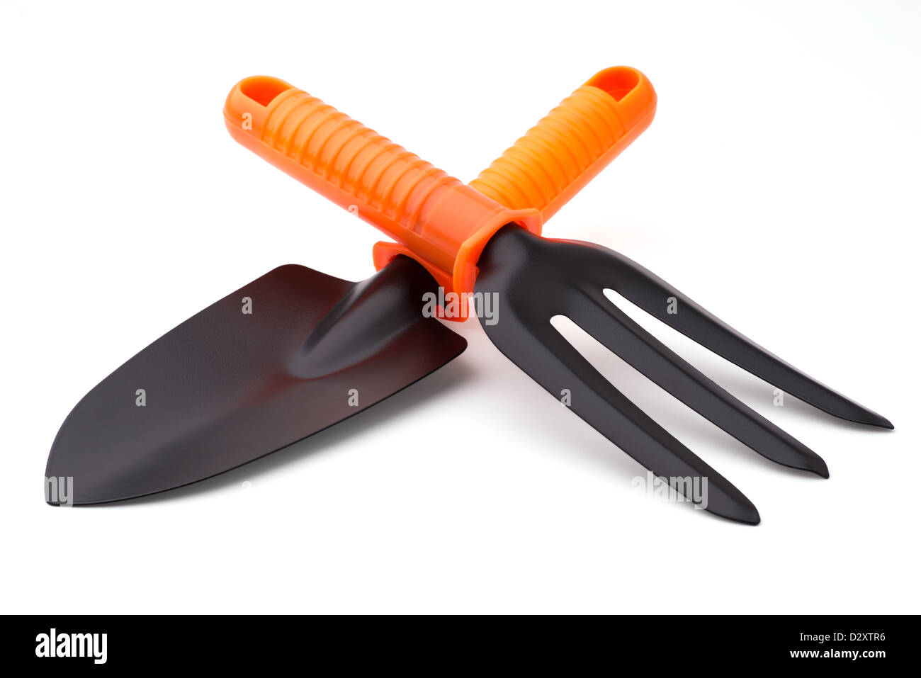 Gardening: trowel and digging fork, isolated on white background Stock Photo