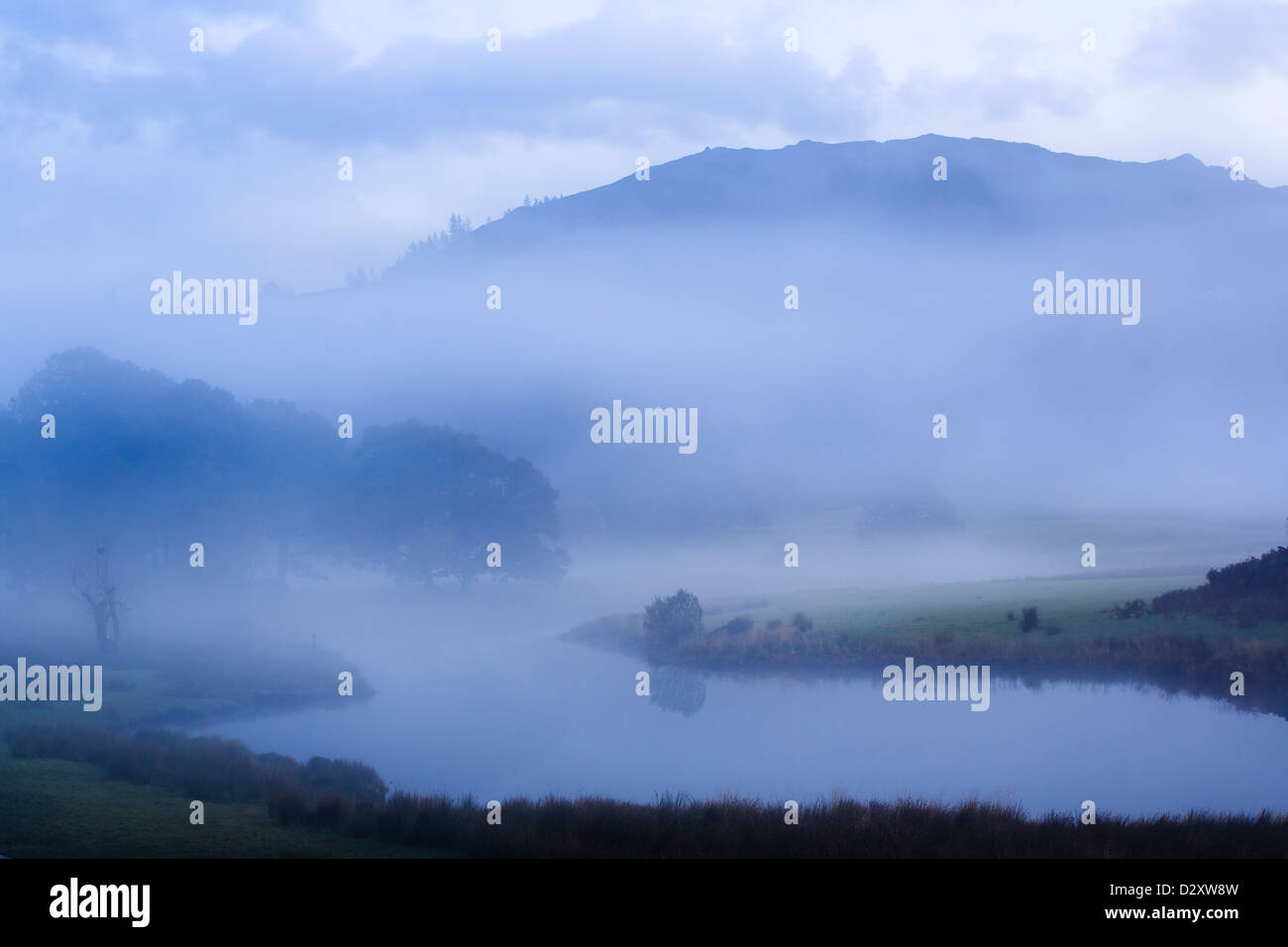 A misty evening, River Brathay, Lake District Cumbria, United Kingdom Stock Photo