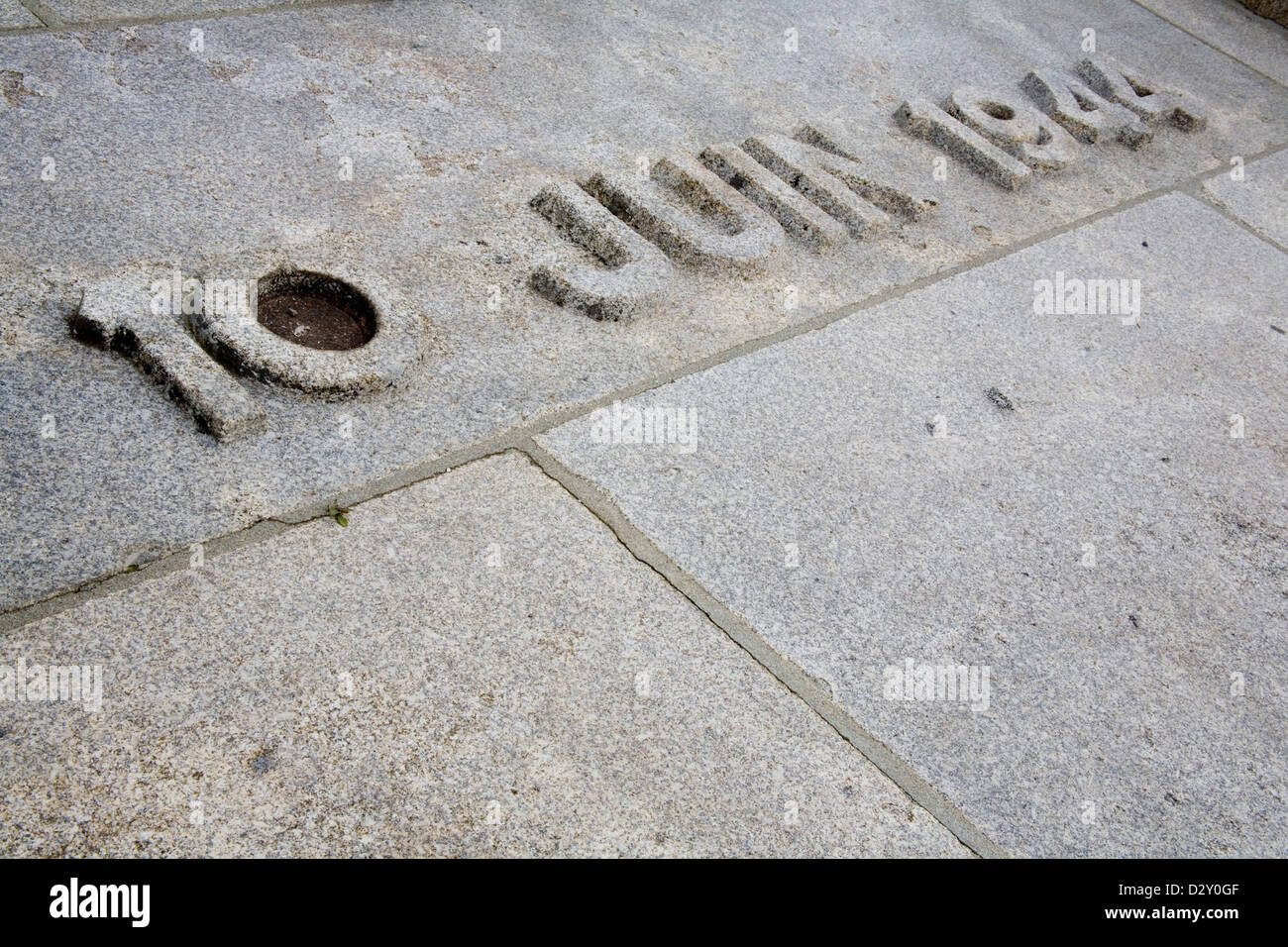 Carved date in stone floor at the French village Oradour-sur-Glane. It reads 10 June 1944 Stock Photo