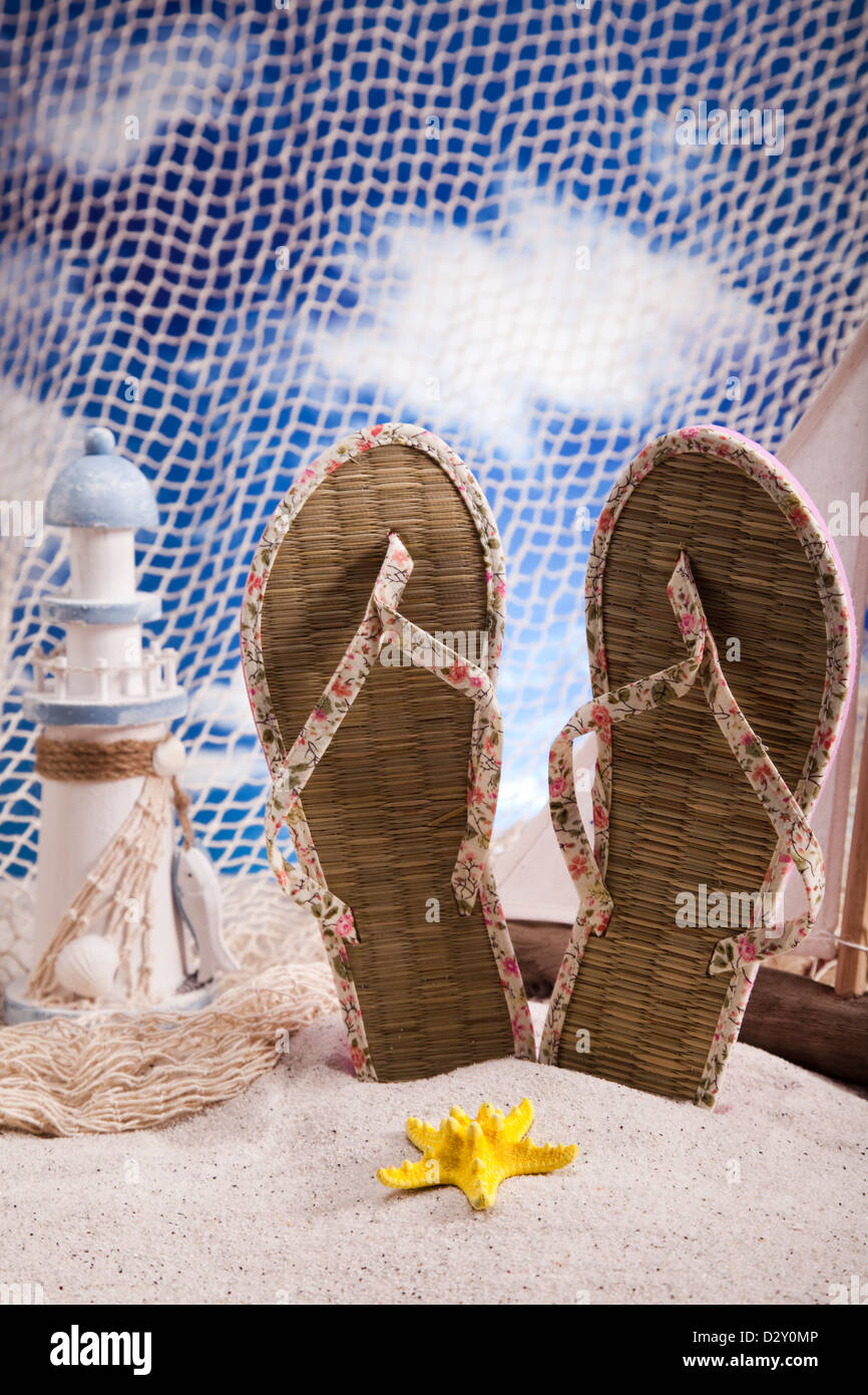 Sand beach and flip flops Stock Photo - Alamy