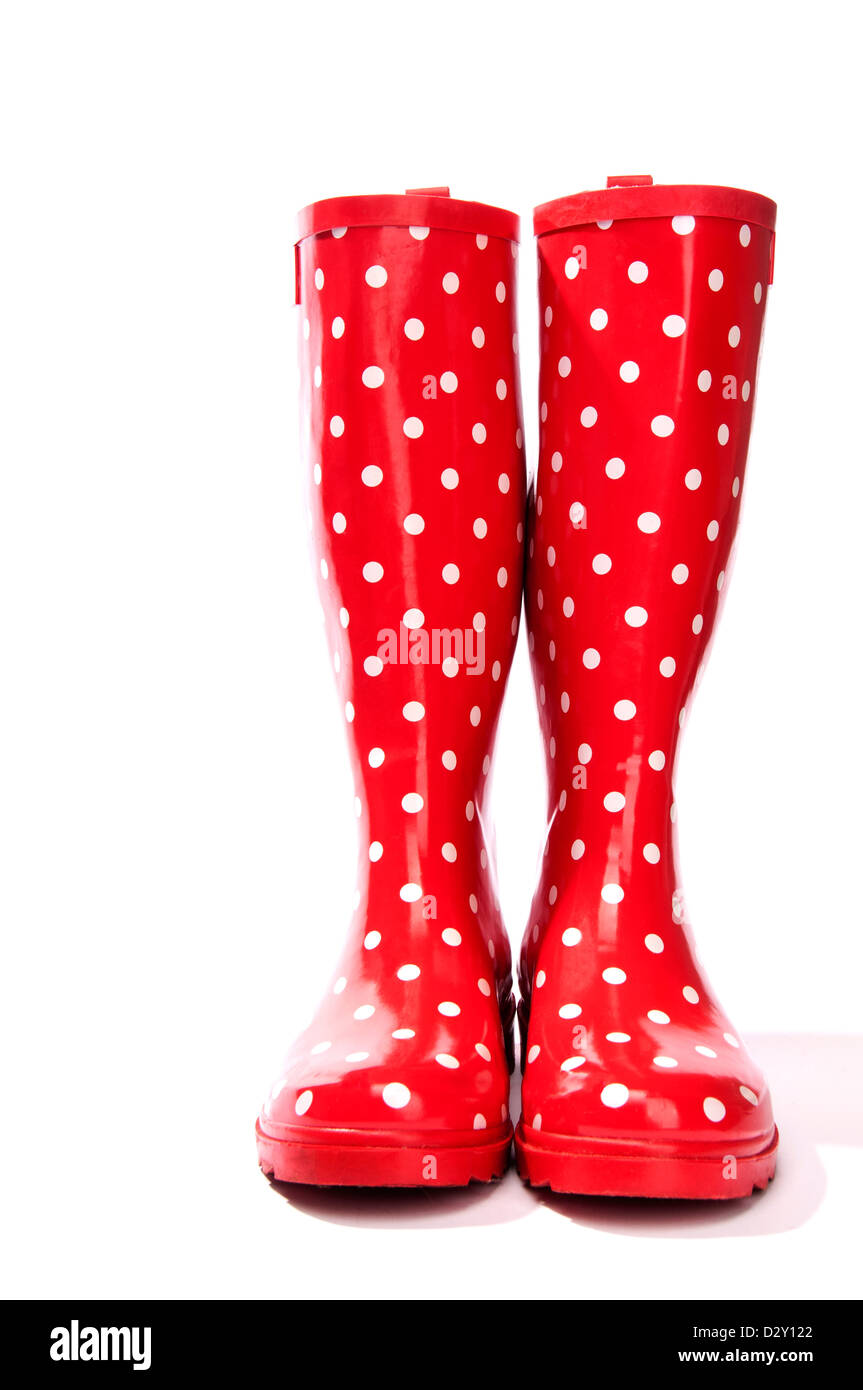 Red and white polka dot boots facing forward Stock Photo