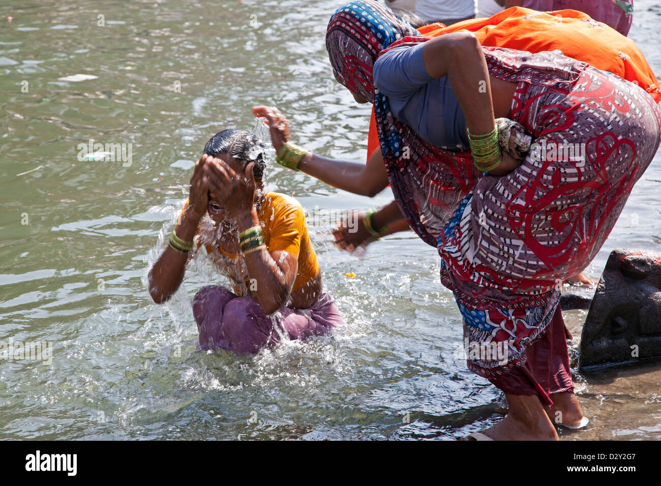 Women Bathing In The Sacred Waters Of The Godavari River Nasik India 