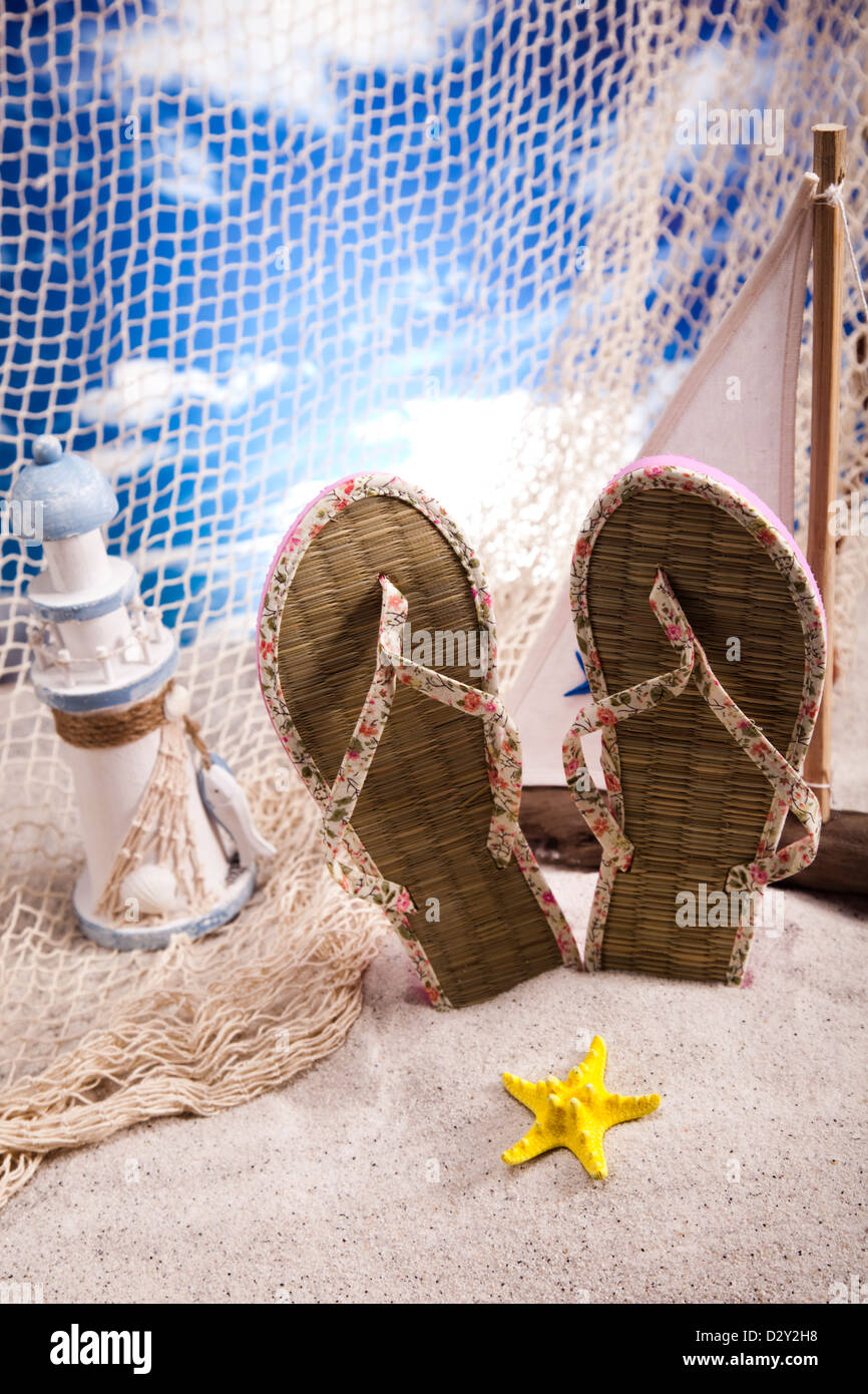 Flip flops and sand Stock Photo Alamy