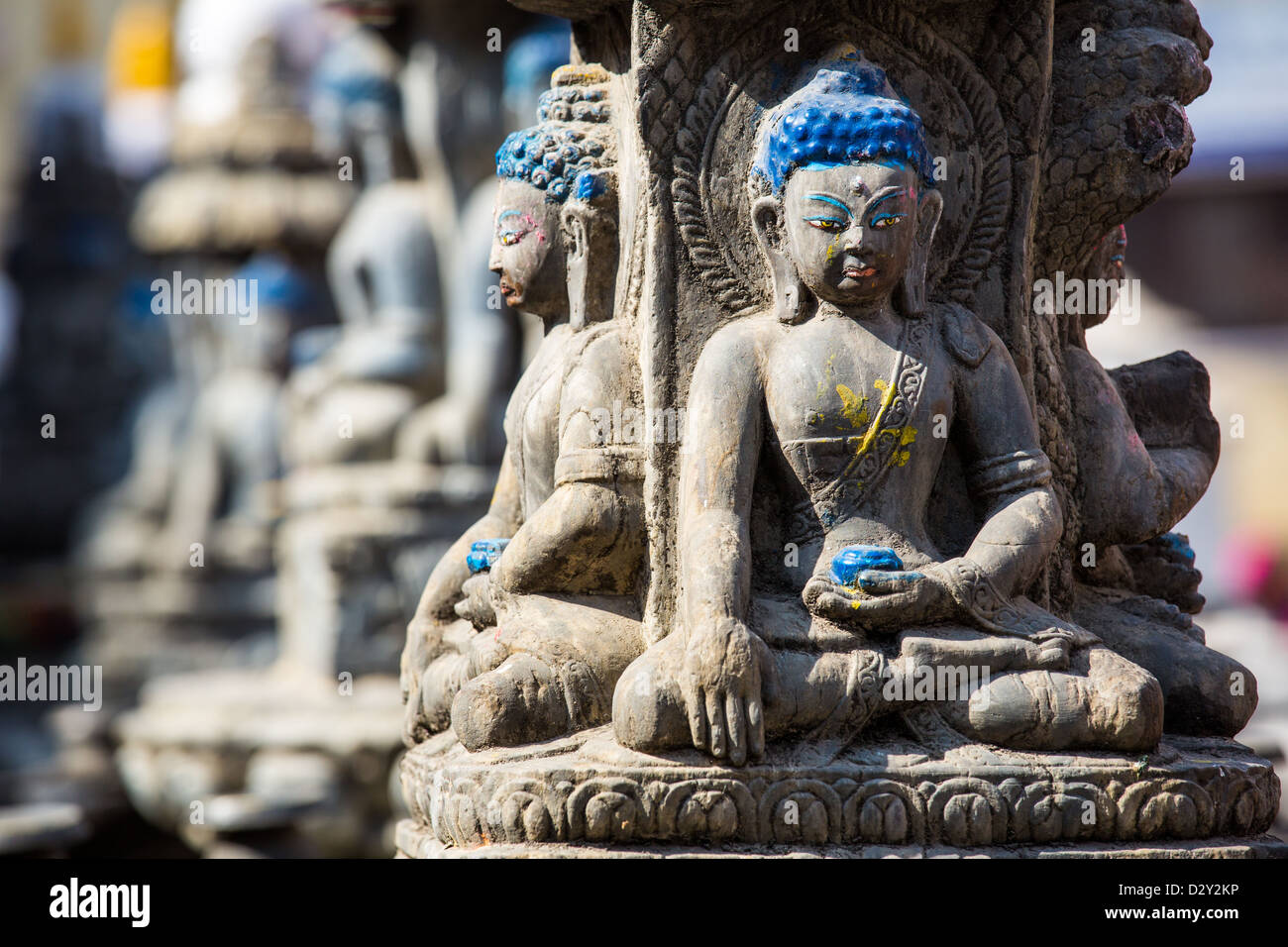 Small Buddha sculptures at Shree Gha Buddhist Stupa, Thamel, Kathmandu, Nepal Stock Photo