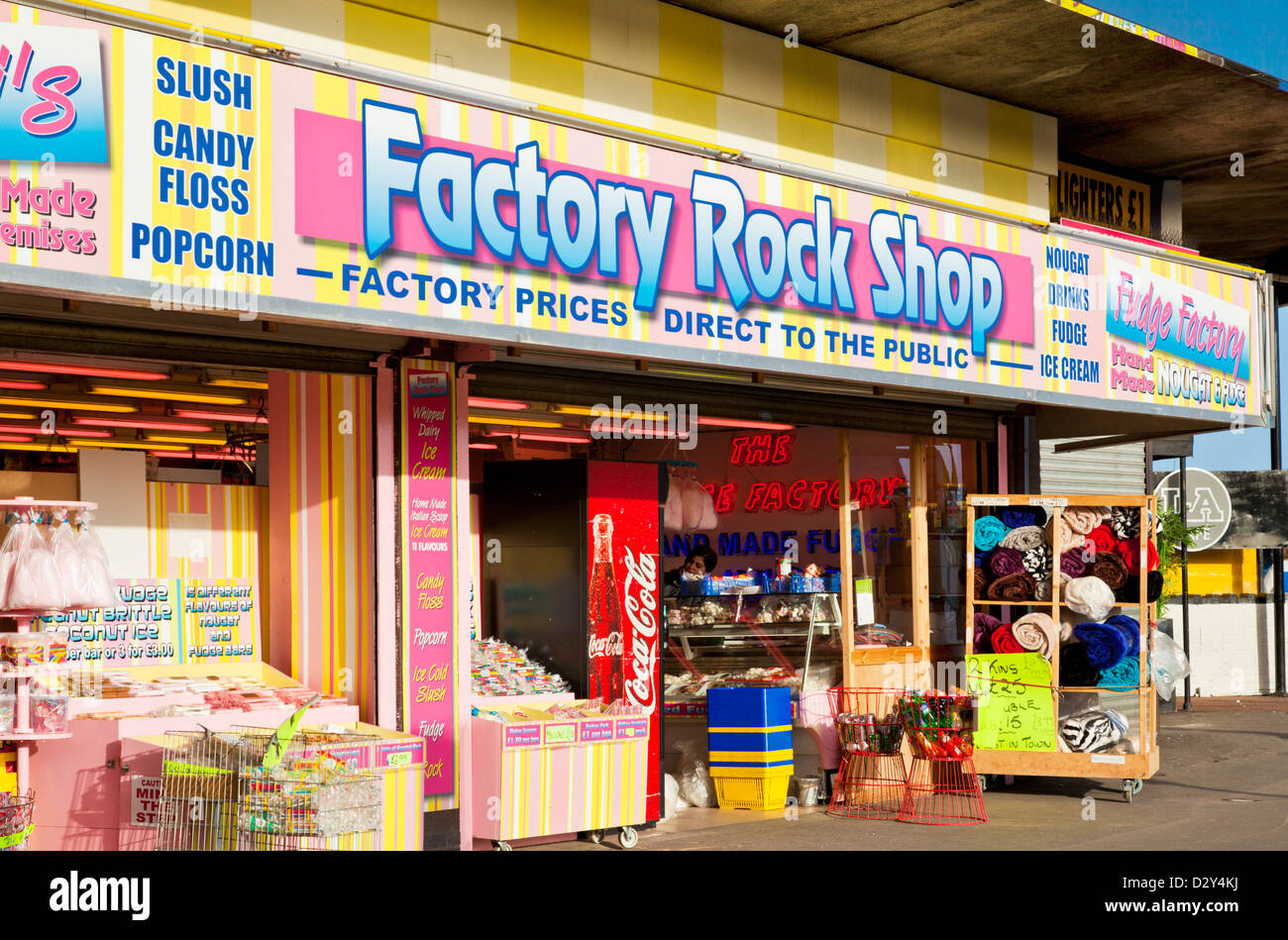 Signs for a factory Rock shop at  Skegness seafront Lincolnshire England UK GB EU Europe Stock Photo