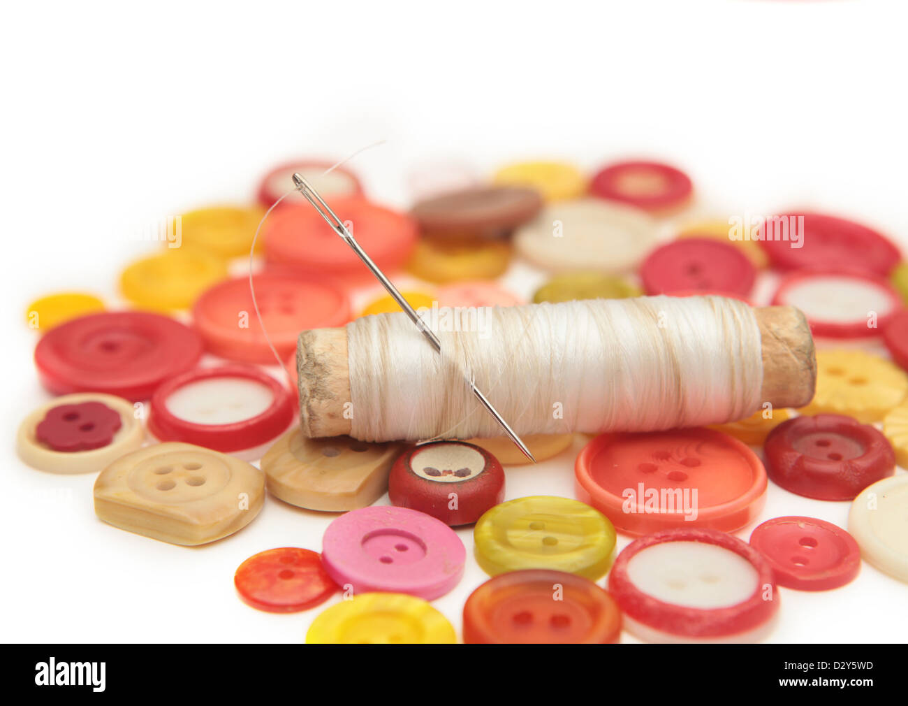 Needle and thread and buttons hi-res stock photography and images