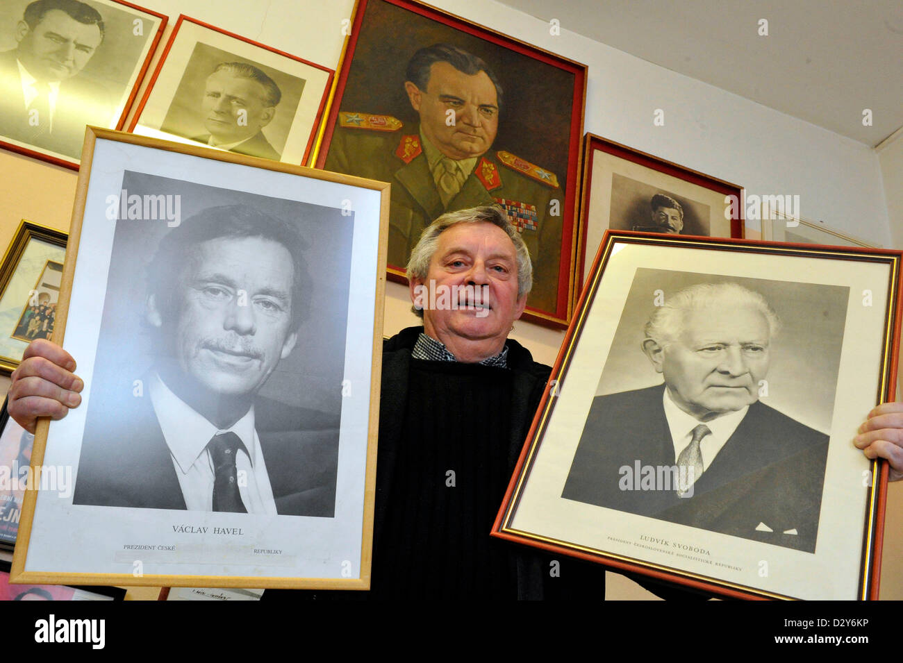 Glazier Dalibor Zabka shows official presidential portraits from his collection in Blansko, Czech Republic on February 4, 2013. Dalibor Zabka is an entusiastic collector of the official portraits of the Czechoslovak and later Czech presidents which were shown in officies and schools. (CTK Photo/Vaclav Salek) Stock Photo