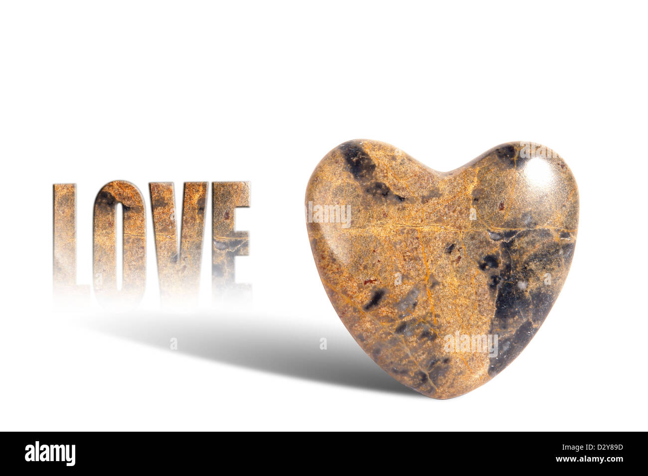 Marble heart casting LOVE shadow over white background Stock Photo
