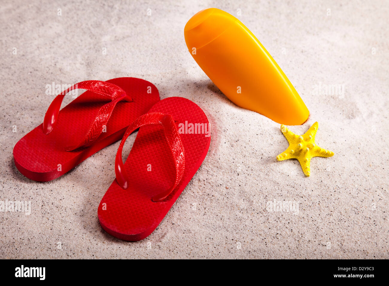 Flip flops on the beach, suntan Stock Photo - Alamy
