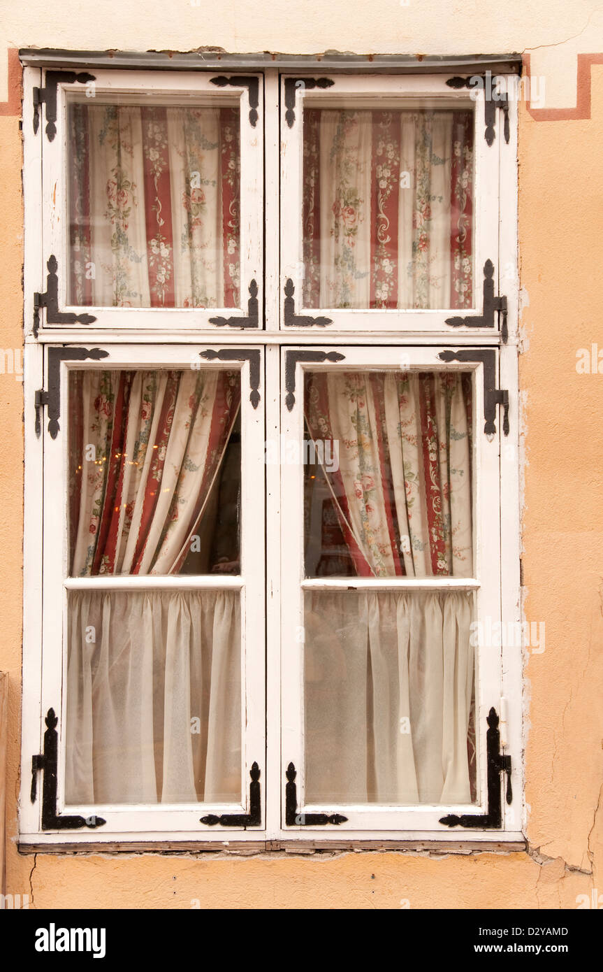 Very old wooden window with flowers on curtains Stock Photo - Alamy