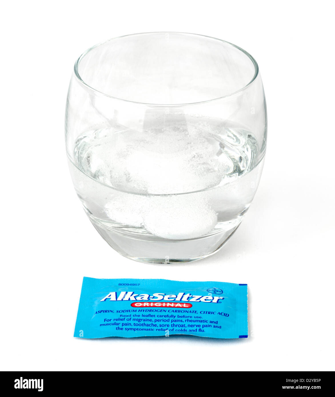 Alka-Seltzer Tablets fizzing in a glass of water Stock Photo