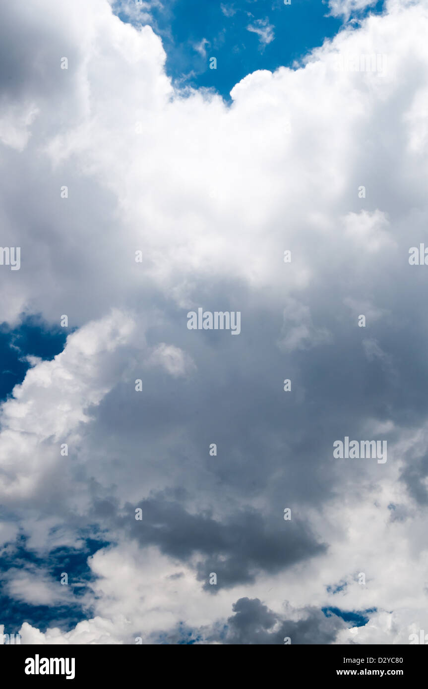 Blue sky with white and grey clouds Stock Photo Alamy