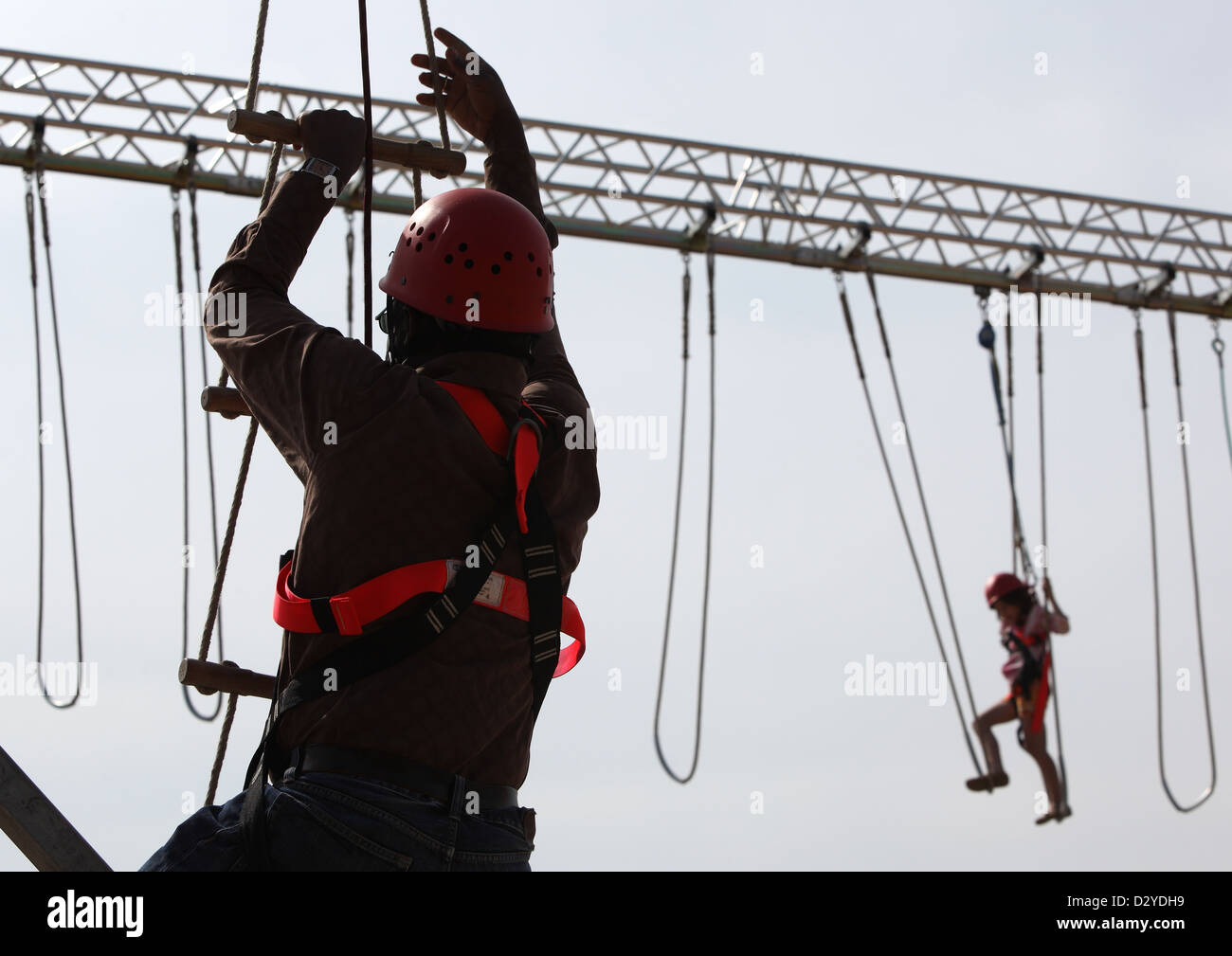 Berlin, Germany, people climbing in a high ropes course Stock Photo Alamy