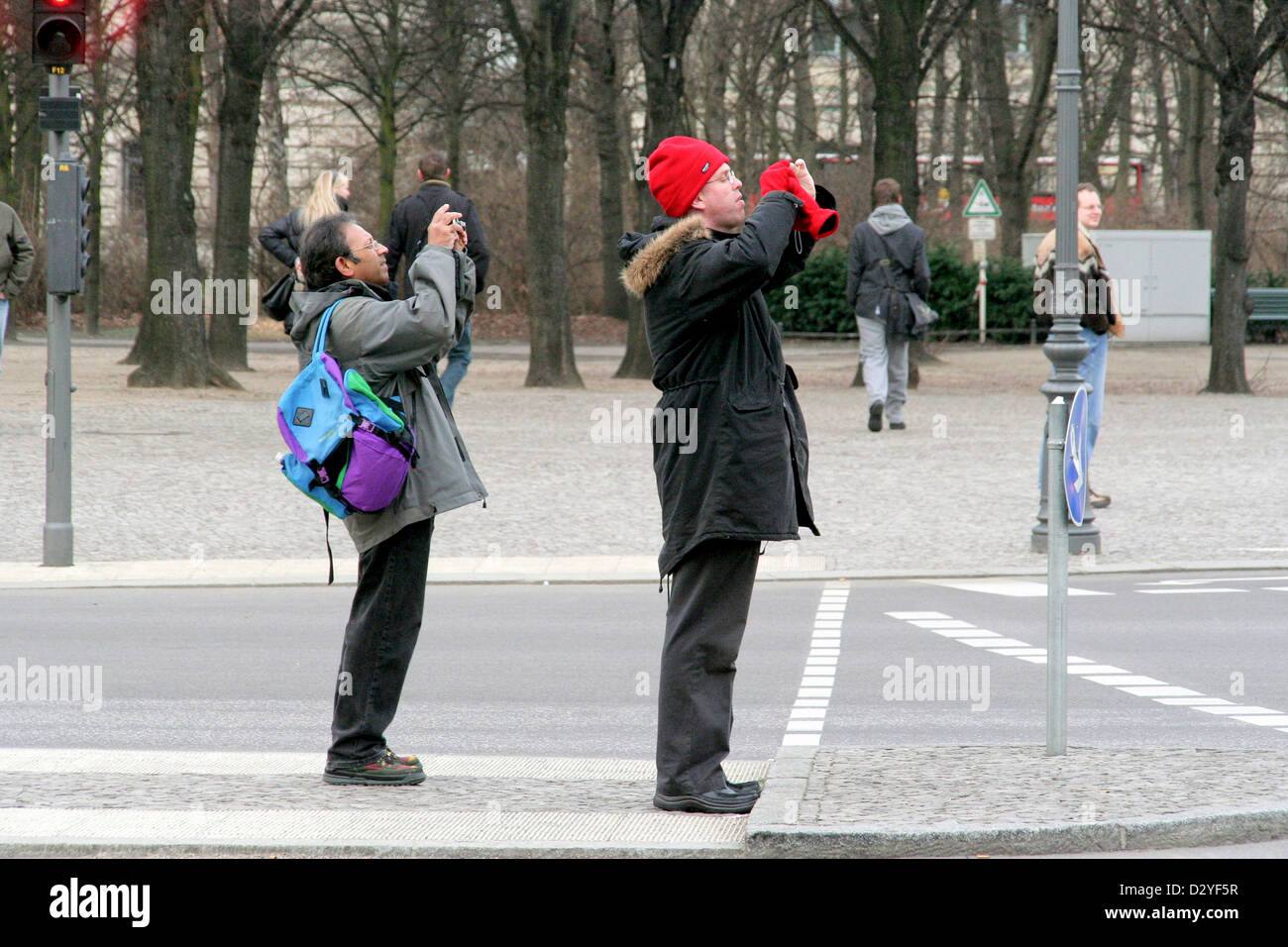 Male Photographers taking a picture of the Brandenburg Gate in Berlin ...