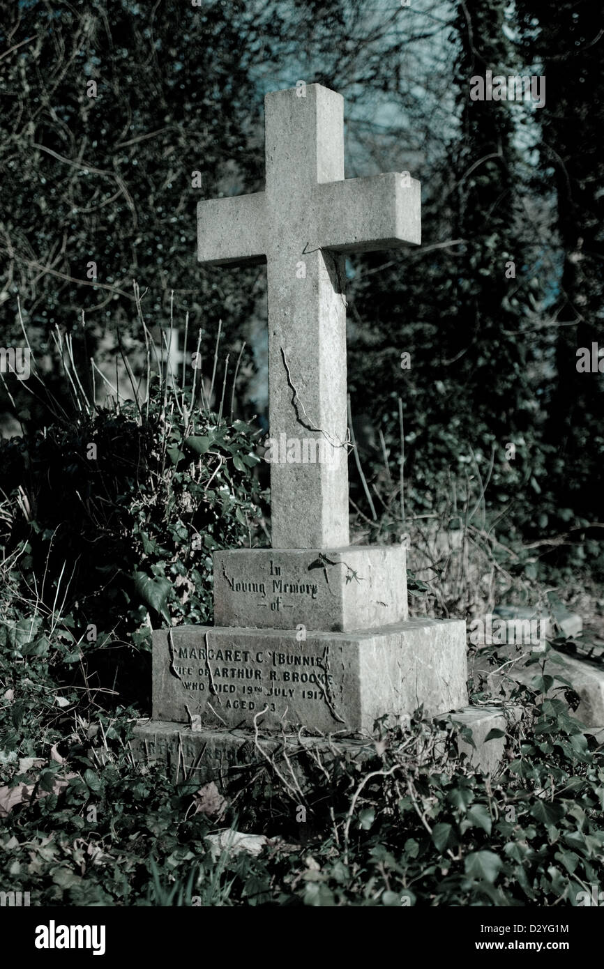 A gravestone cross in Highgate cemetery London UK Stock Photo Alamy