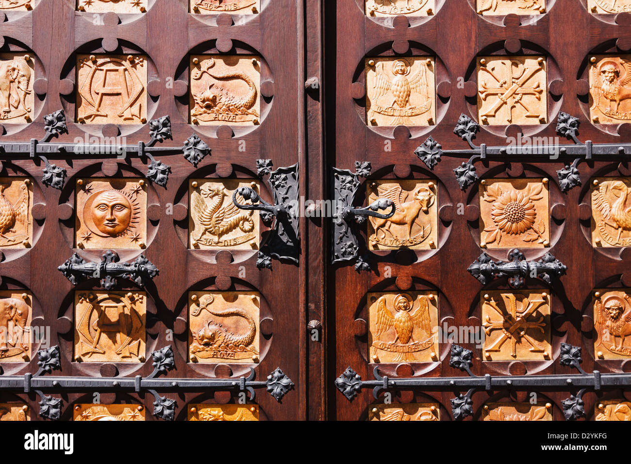 Classical elements and 4 evangelists representations at the doors of the Abbey of Saint Thomas Stock Photo