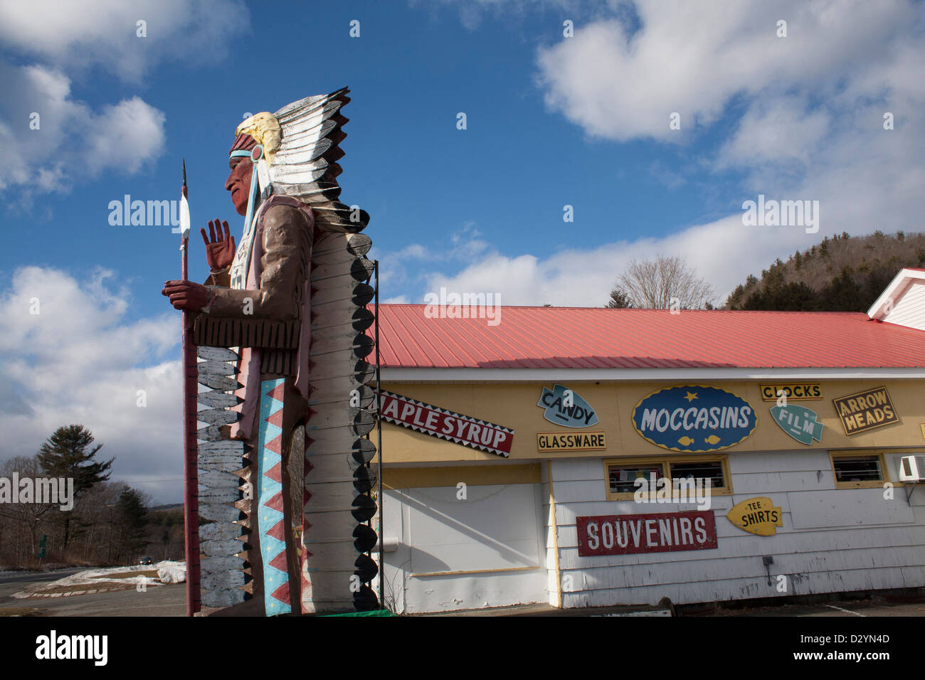 A tourist shop with Native American goods and a giant sculpture in New England is closed for the winter season. Stock Photo