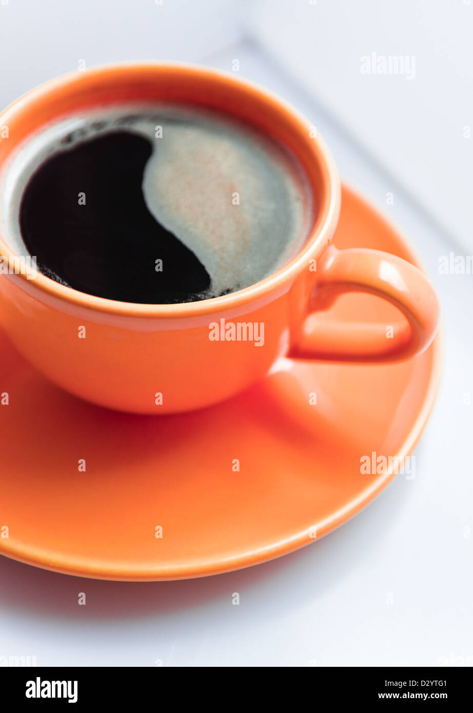 Coffee in an yellow cup Stock Photo Alamy
