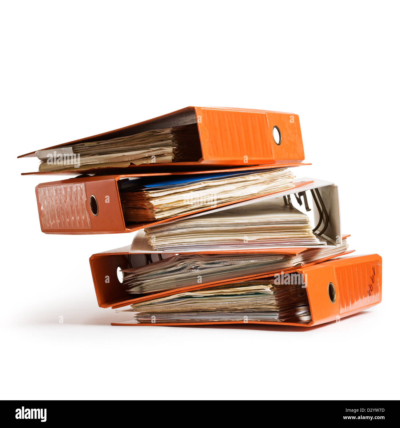 Stack of orange old ring binders on white background clipping path included Stock Photo