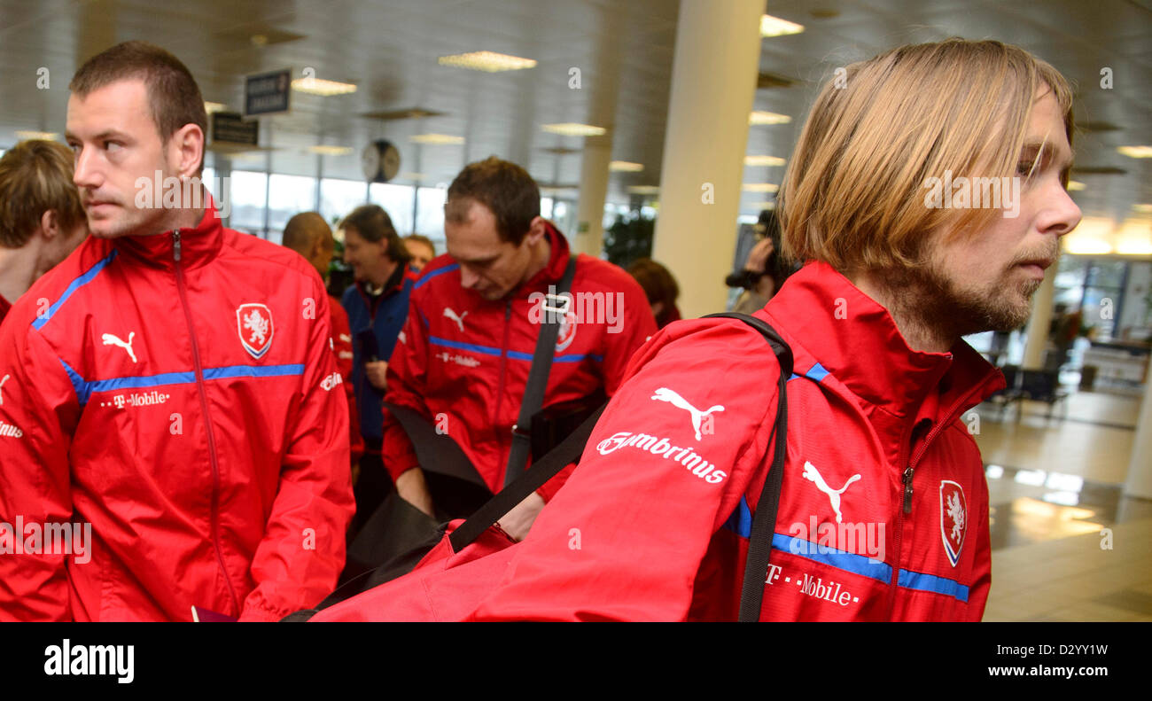 Player of Czech Republic soccer team Jaroslav Plasil (right) is seen at Prague's Vaclav Havel Airport in Prague, Czech Republic, February 5, 2013 to leave for Turkey. Czech team is to play friendly match there. (CTK Photo/Michal Kamaryt) Stock Photo