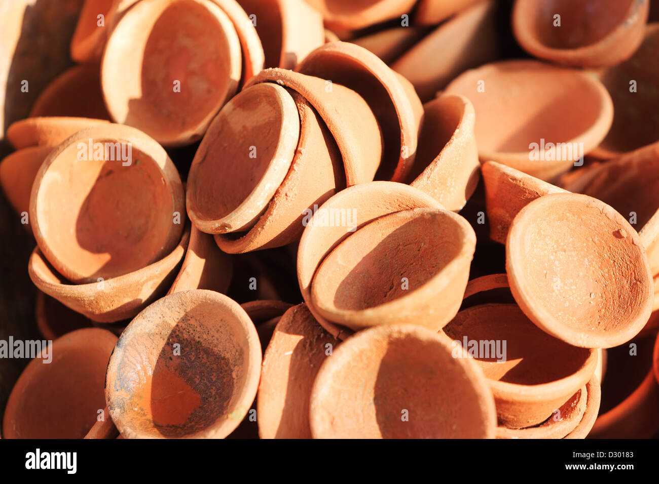 Clay pots for sale. India, Asia. Background Stock Photo