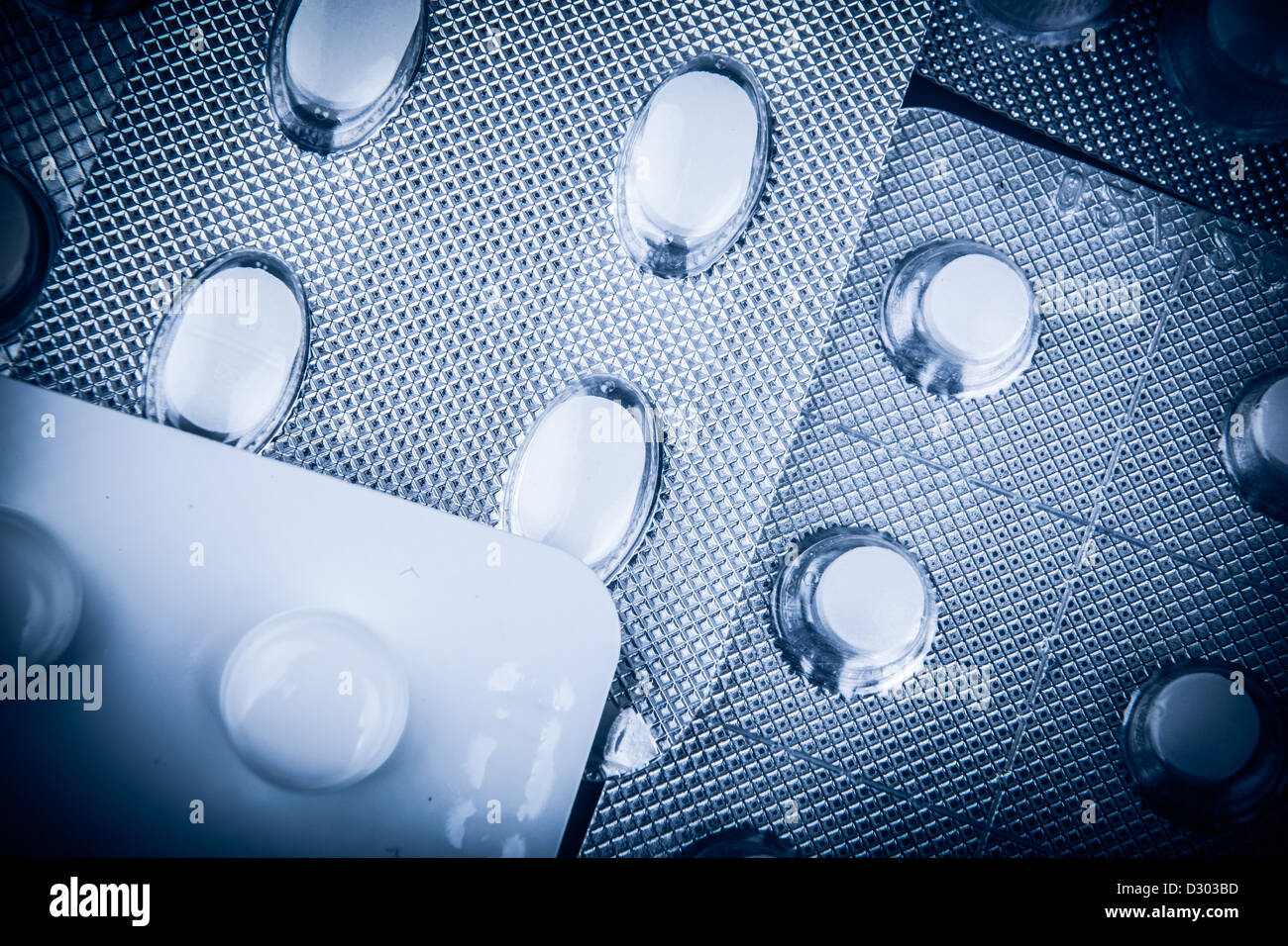 Pills of many shapes and colors grouped together Stock Photo