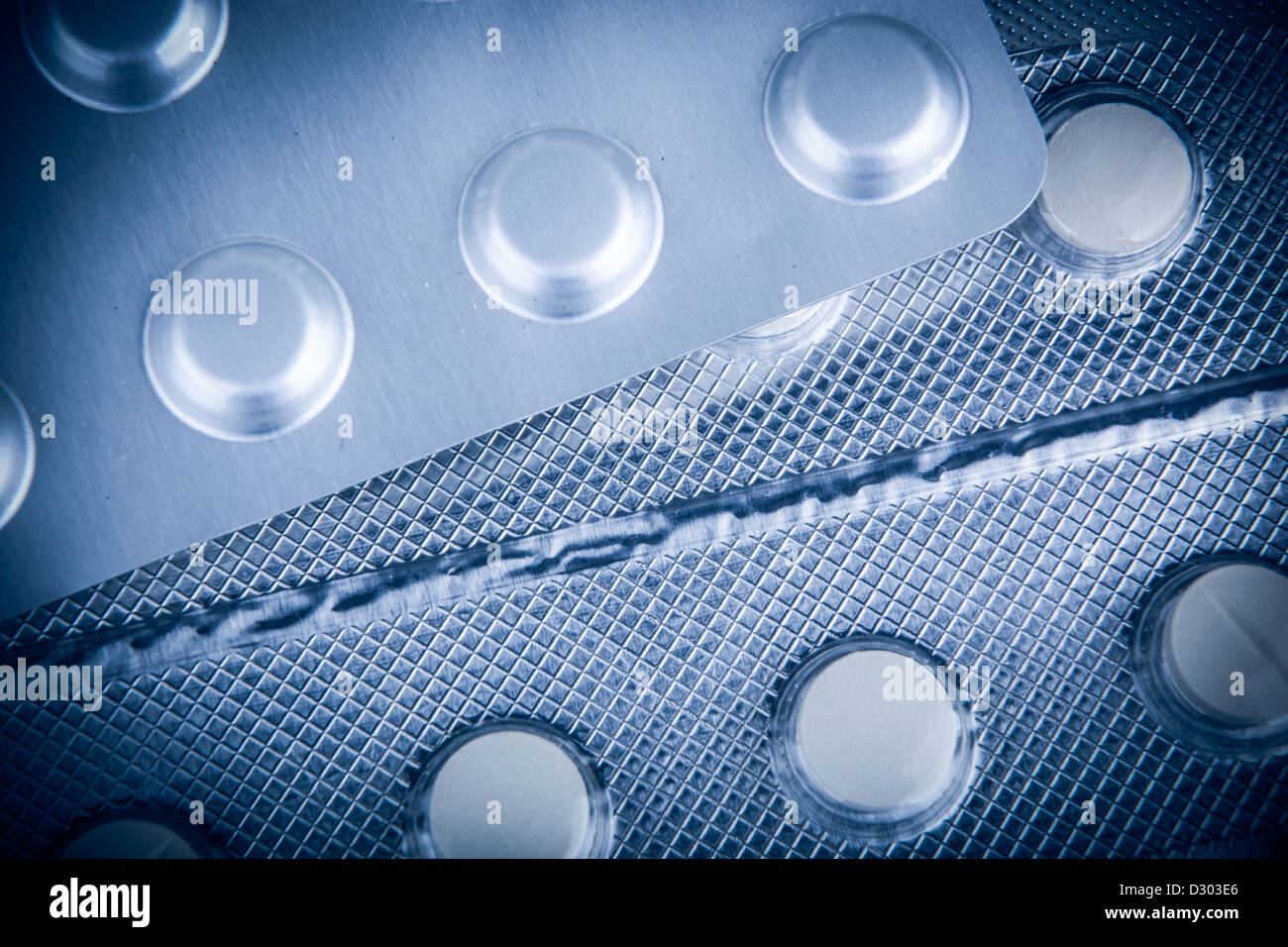 Pills of many shapes and colors grouped together Stock Photo