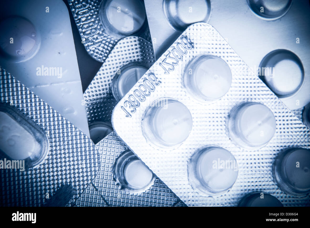 Pills of many shapes and colors grouped together Stock Photo