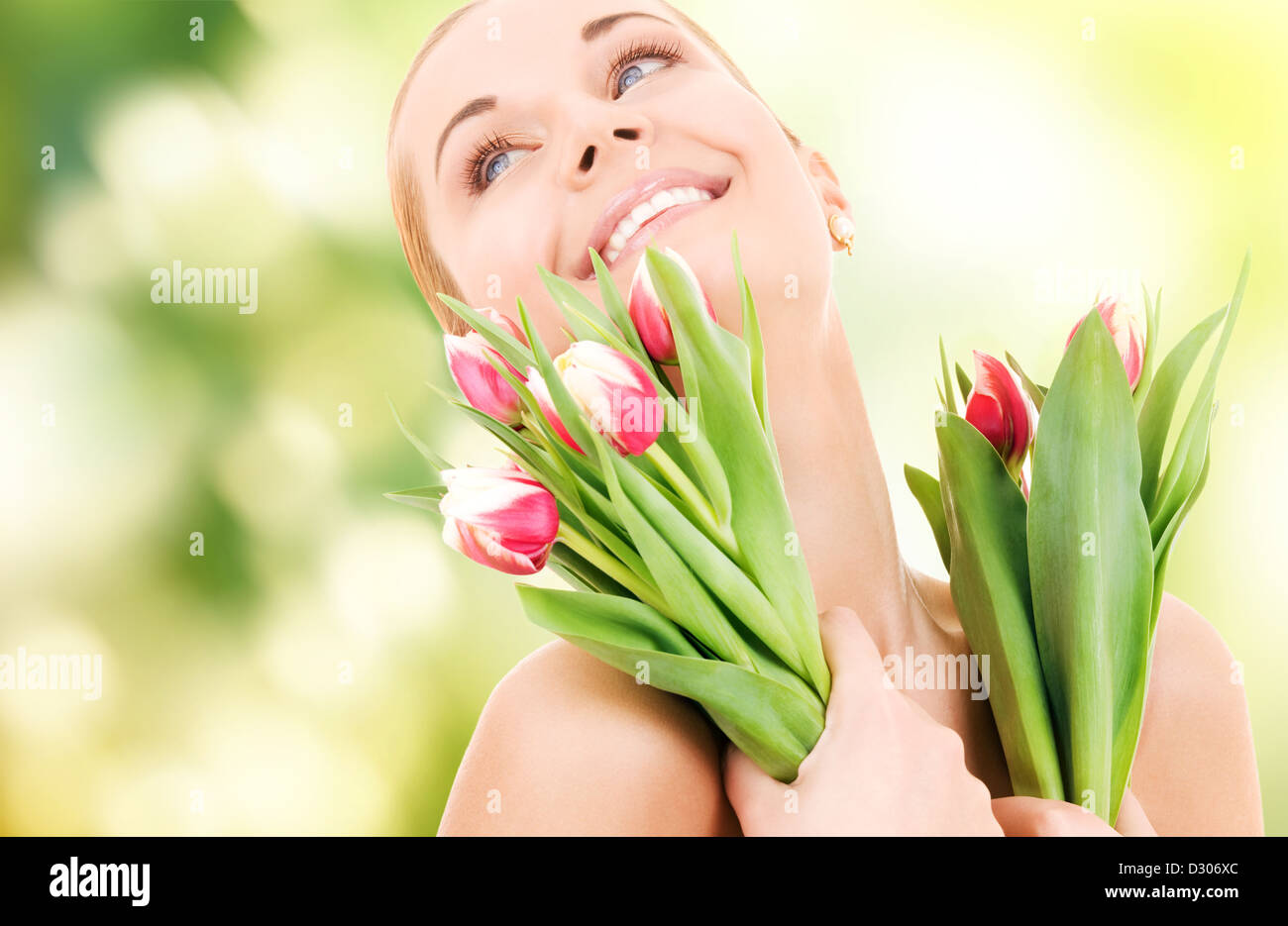 happy woman with flowers Stock Photo